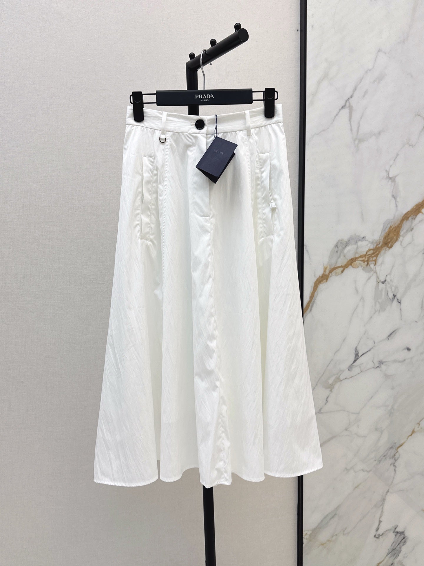 Pra* 25ss Long pleated flared skirt