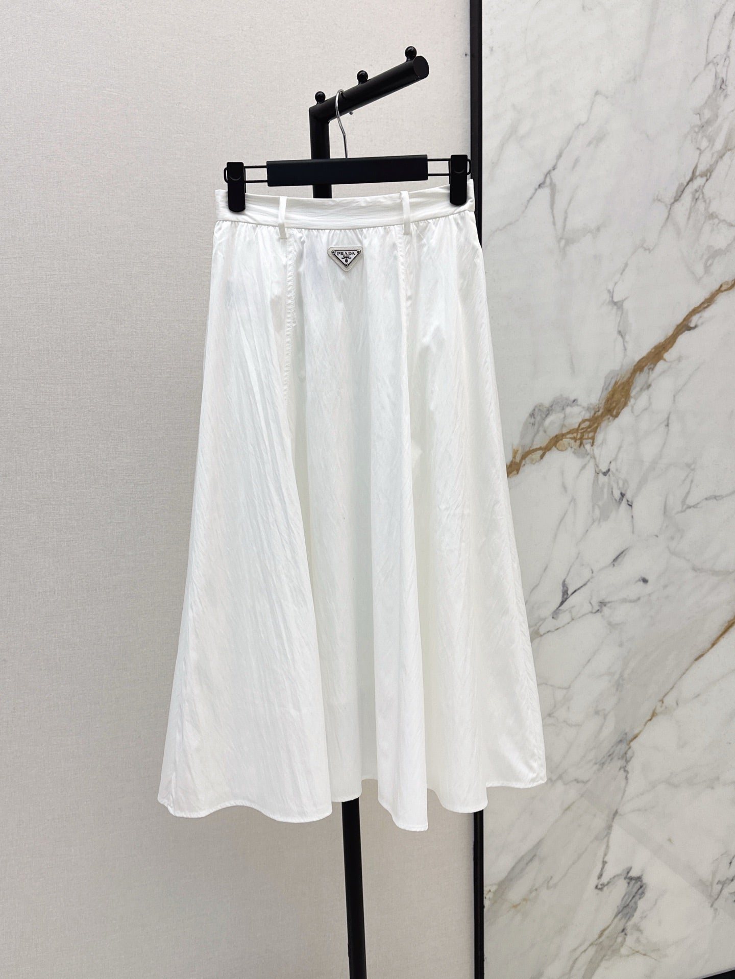 Pra* 25ss Long pleated flared skirt