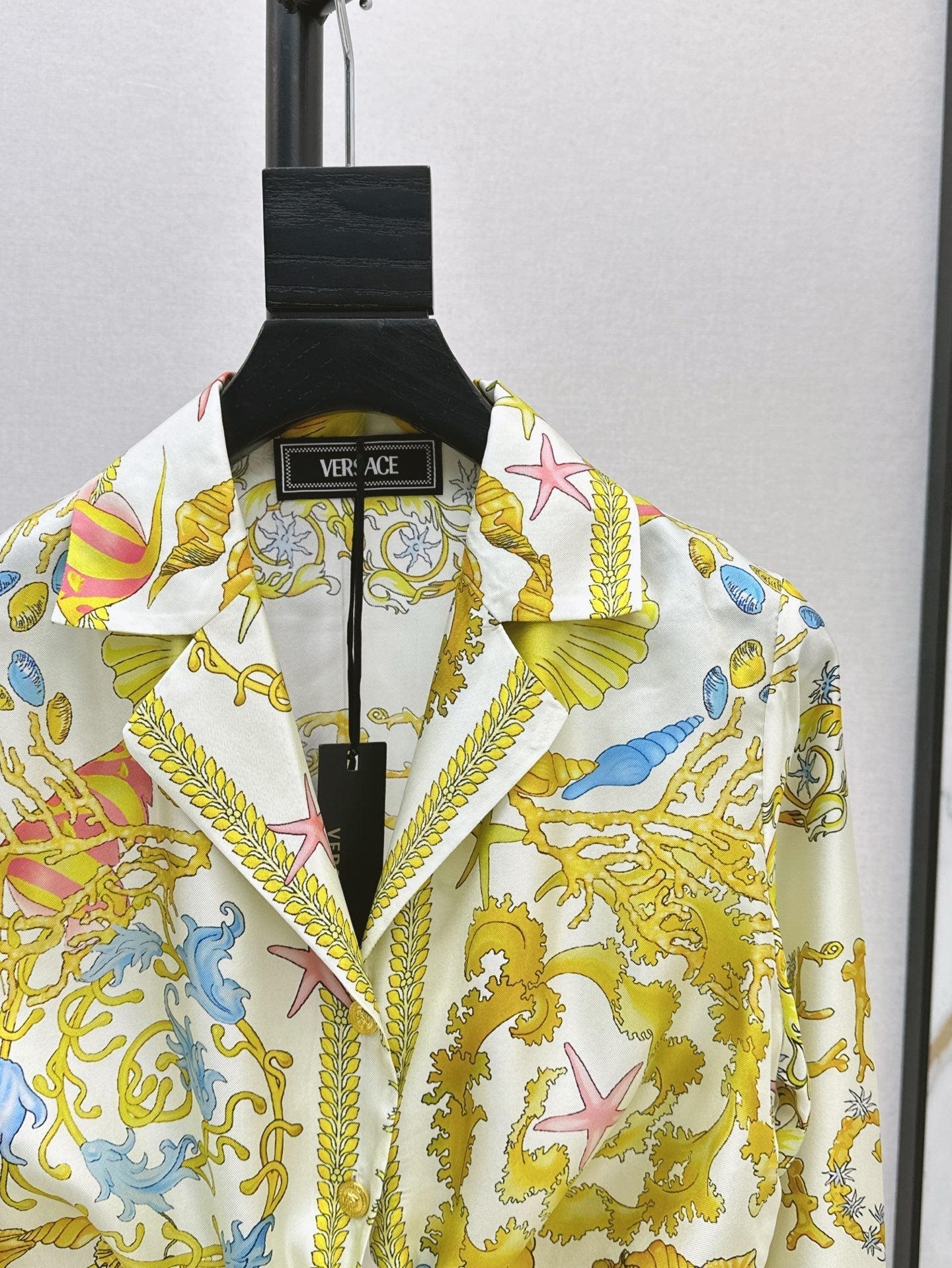 Versa* 25ss Barocco knotted silk shirt