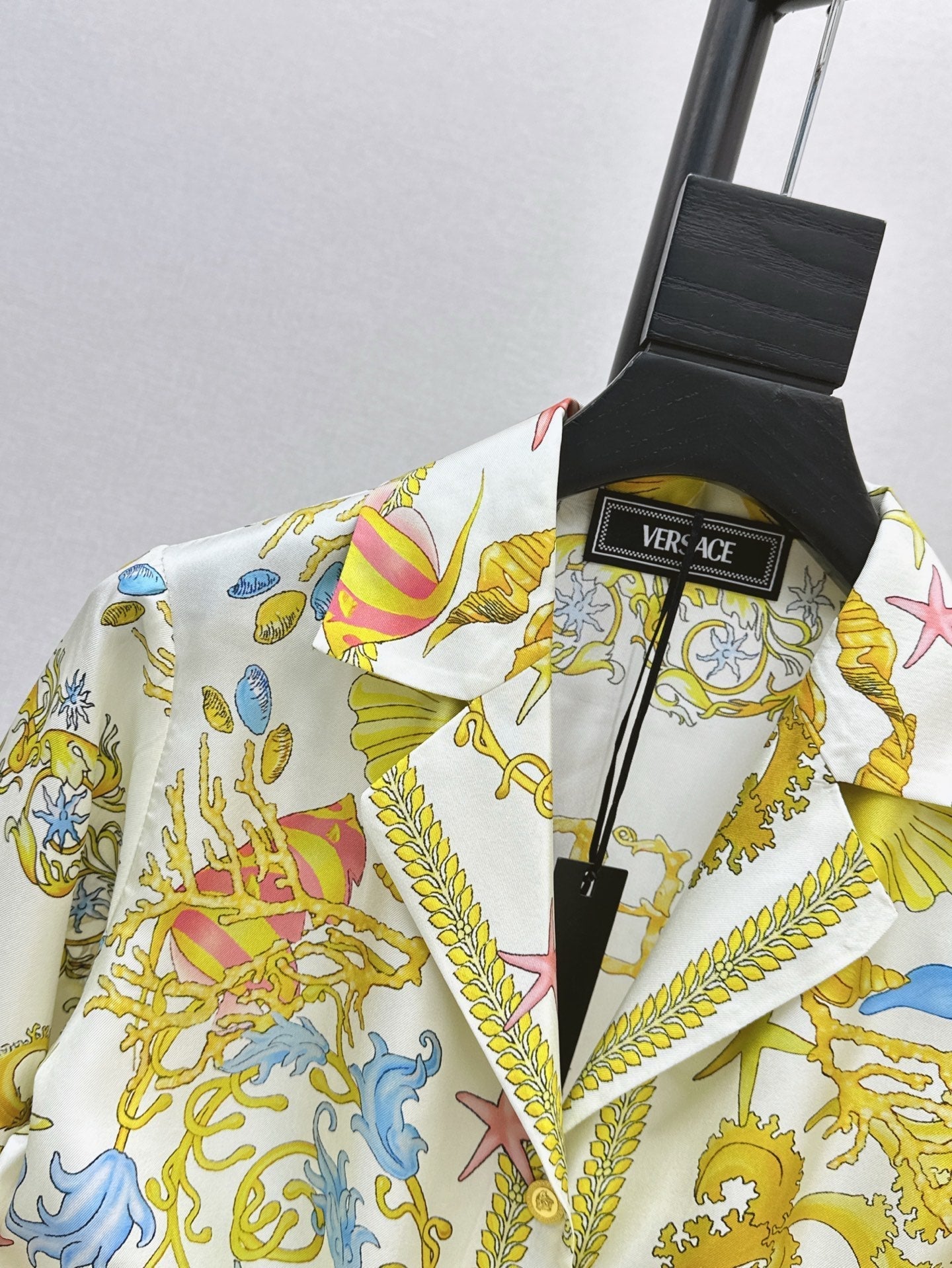 Versa* 25ss Barocco knotted silk shirt