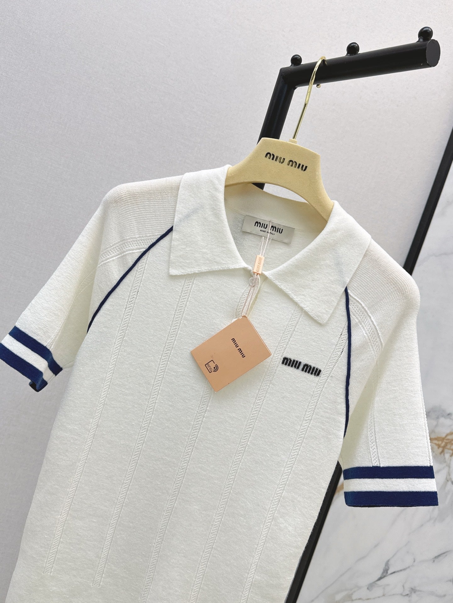 M*u 25ss knit polo shirt