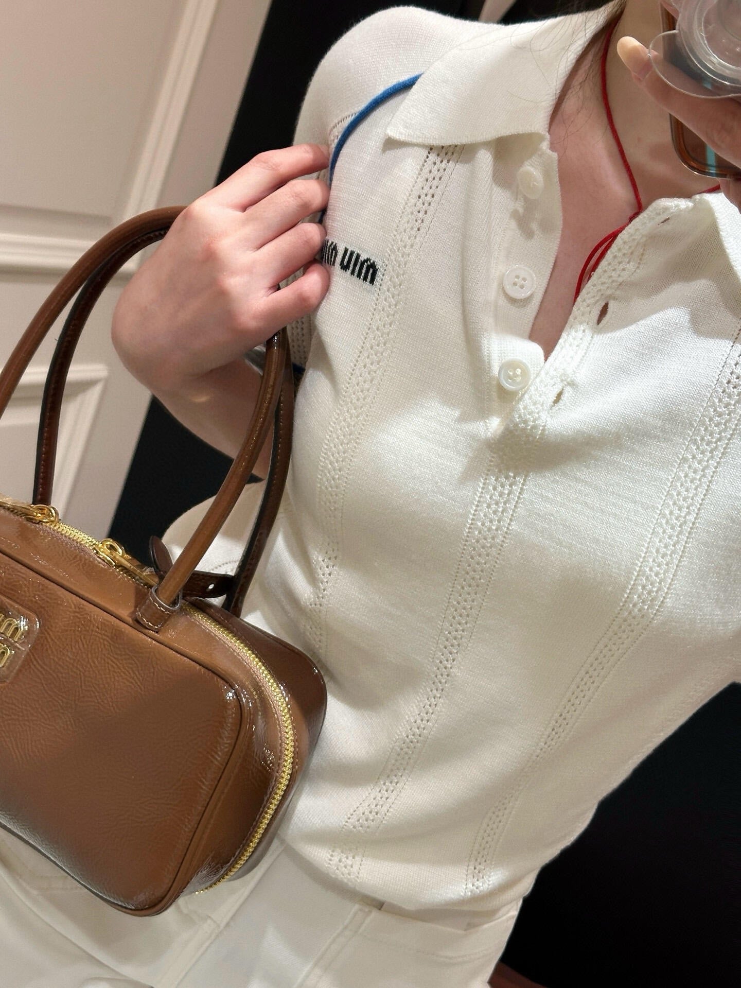 M*u 25ss knit polo shirt