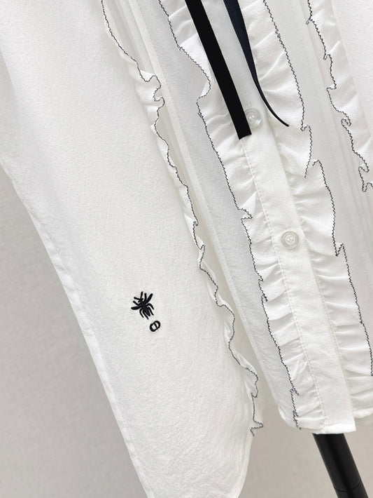 D*r 25ss Ruffled sleeveless shirt with black velvet lace-up