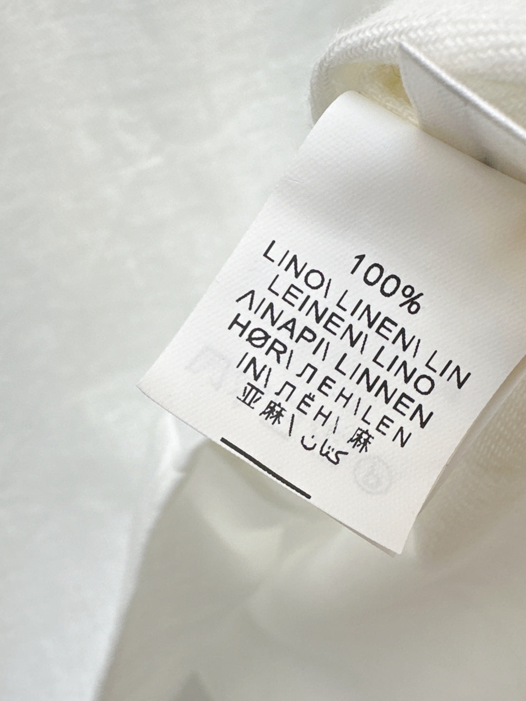 Brune*C 25ss embroidered linen blouse