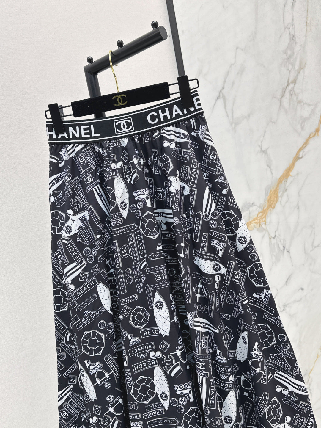 C*nel 25ss technical silk flared skirt