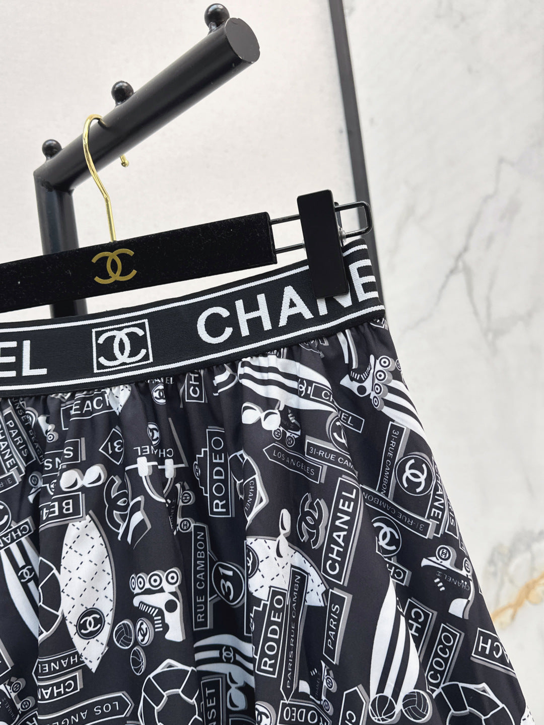 C*nel 25ss technical silk flared skirt