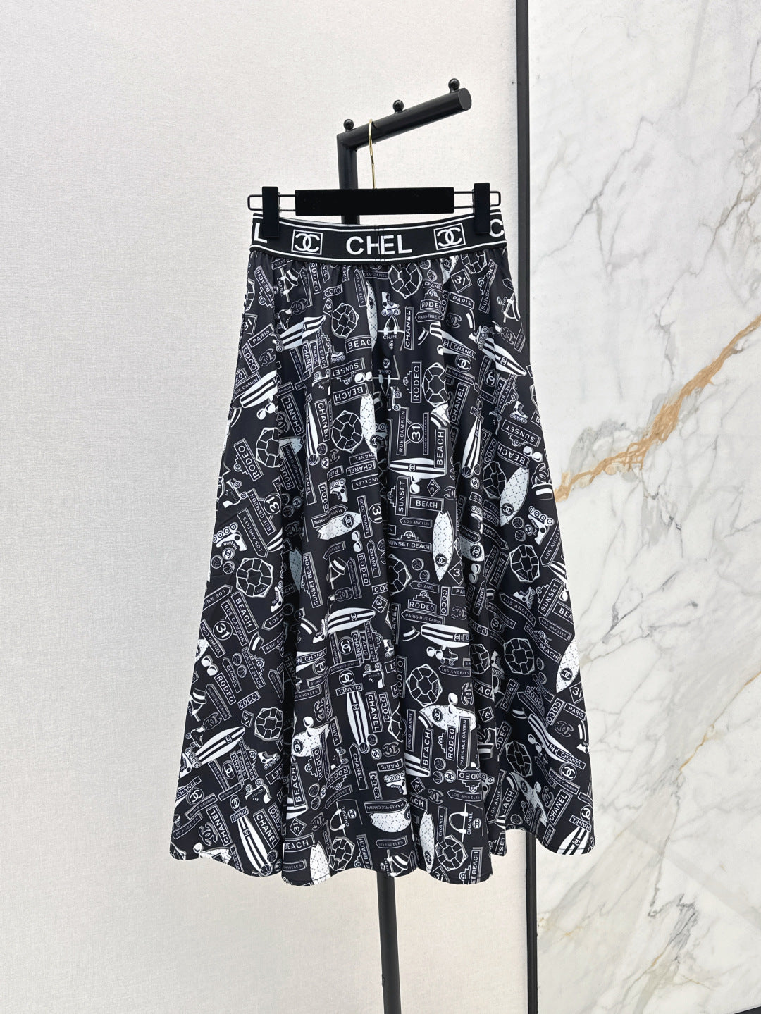 C*nel 25ss technical silk flared skirt