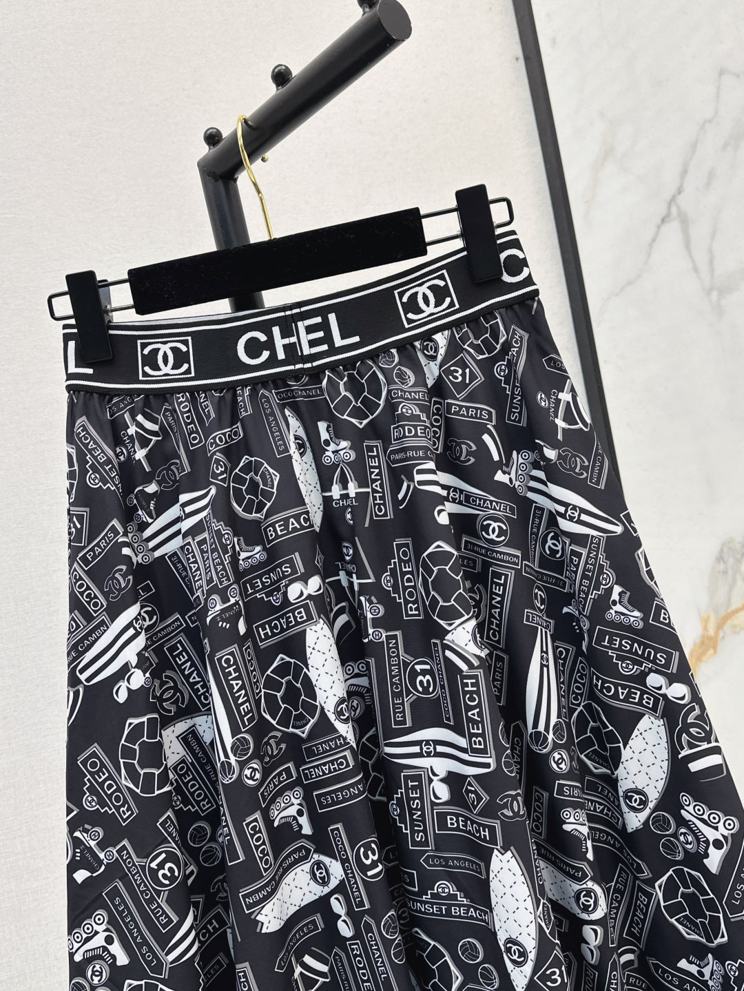 C*nel 25ss technical silk flared skirt