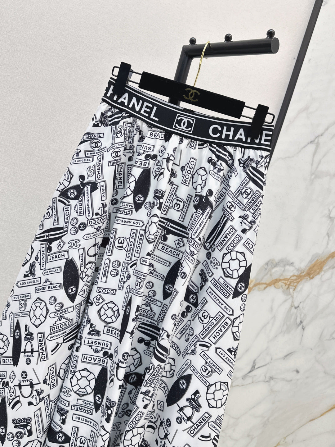 C*nel 25ss technical silk flared skirt