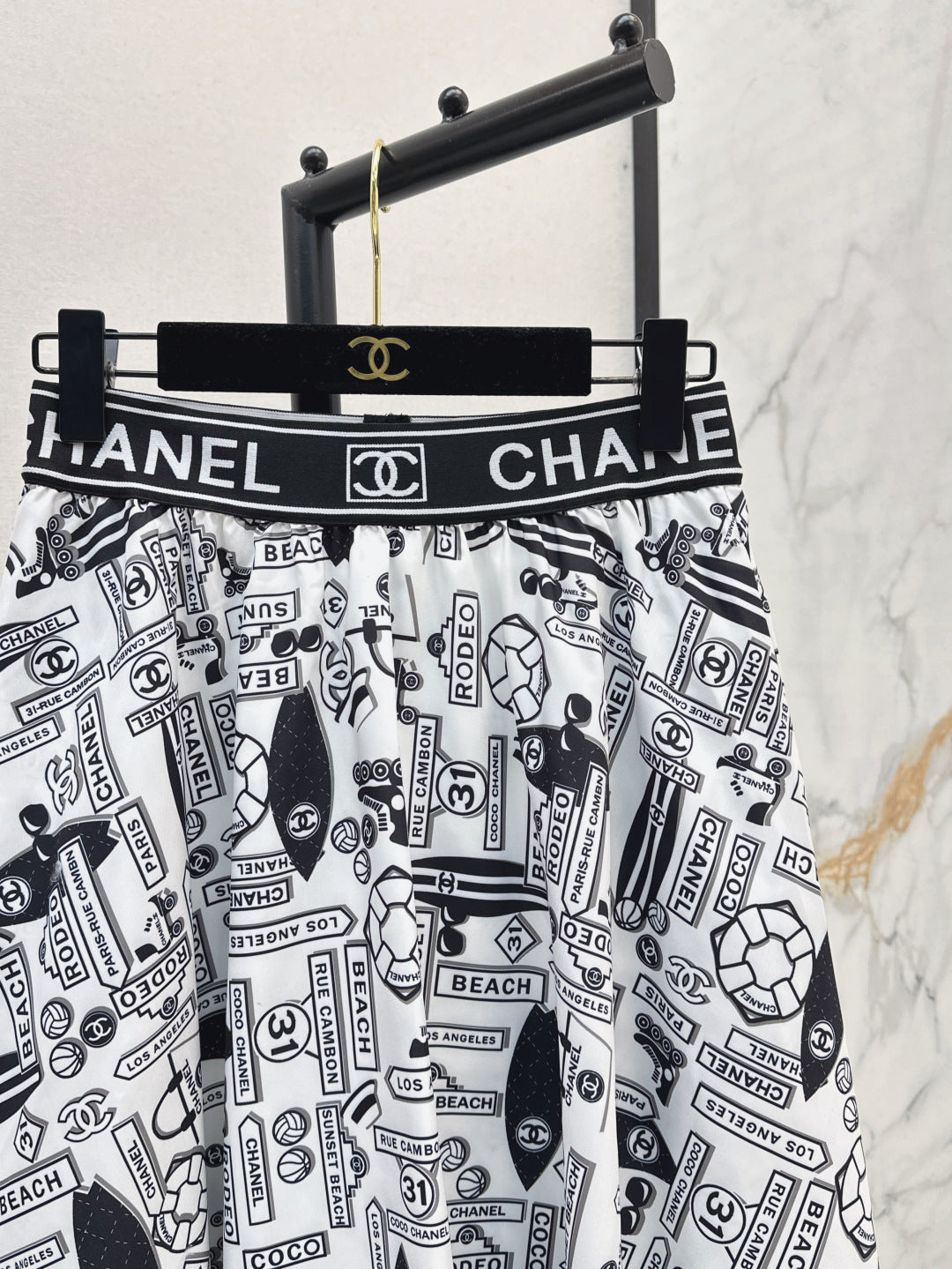 C*nel 25ss technical silk flared skirt