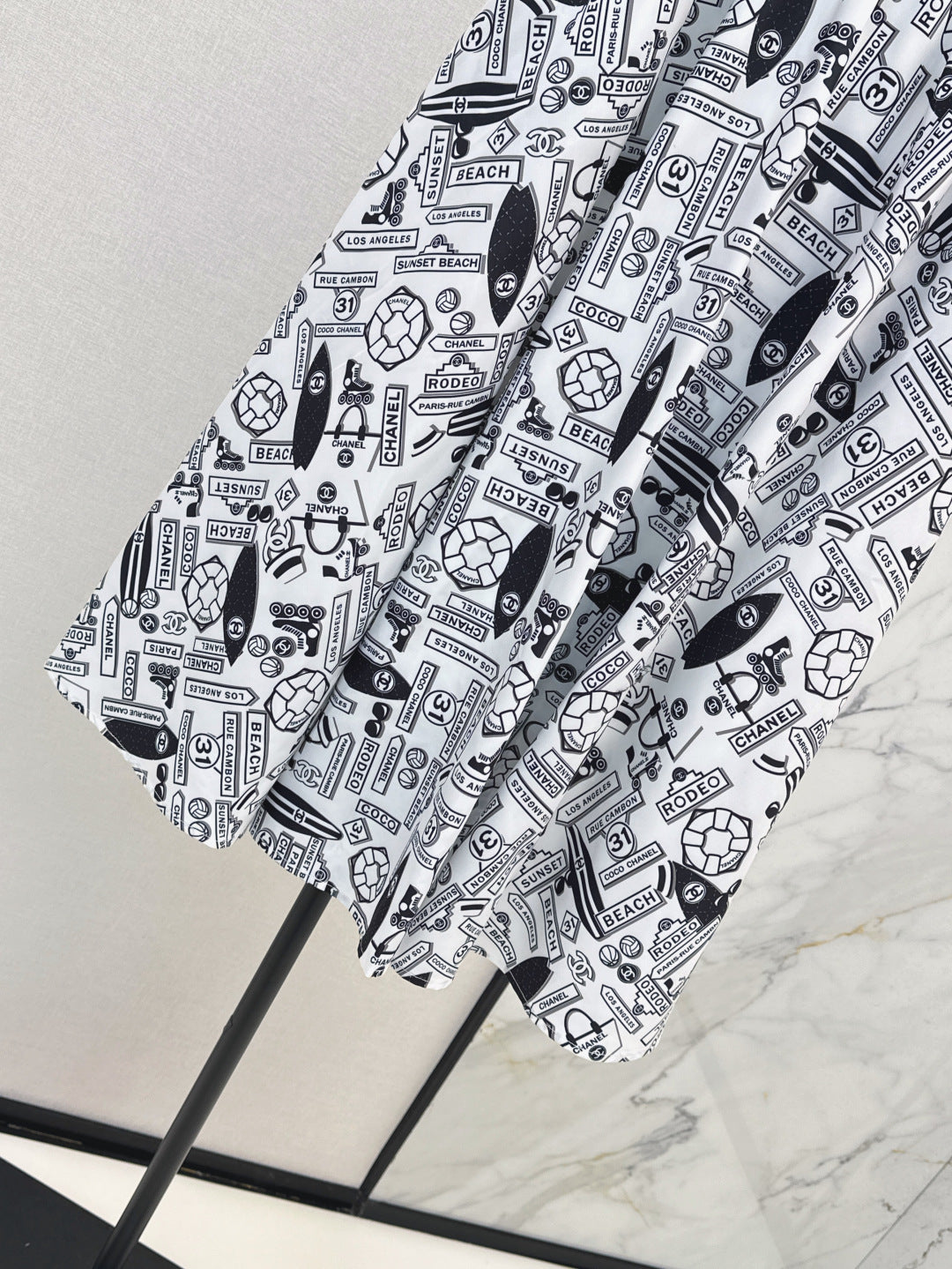 C*nel 25ss technical silk flared skirt