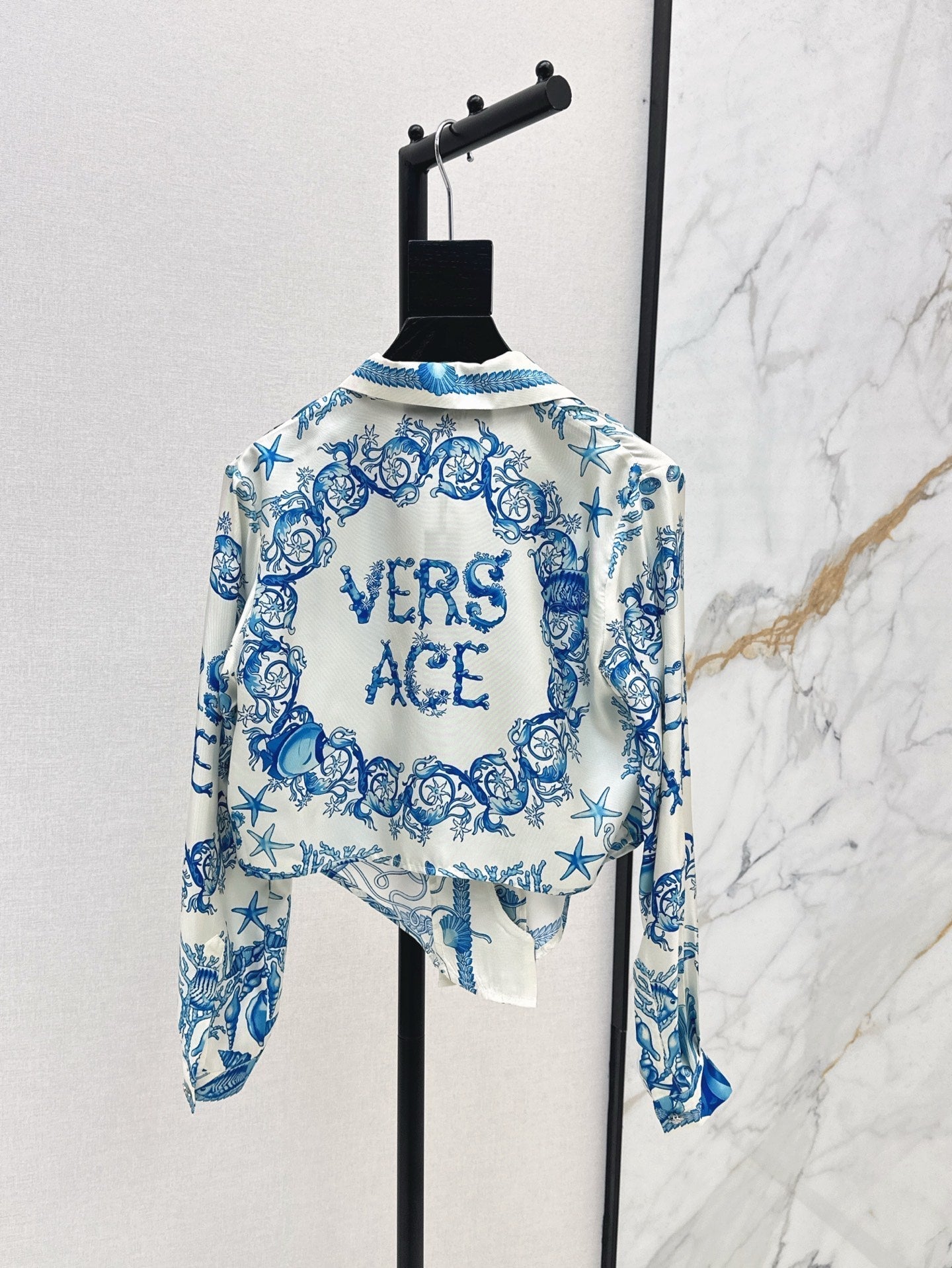 Versa* 25ss printed silk shorts
