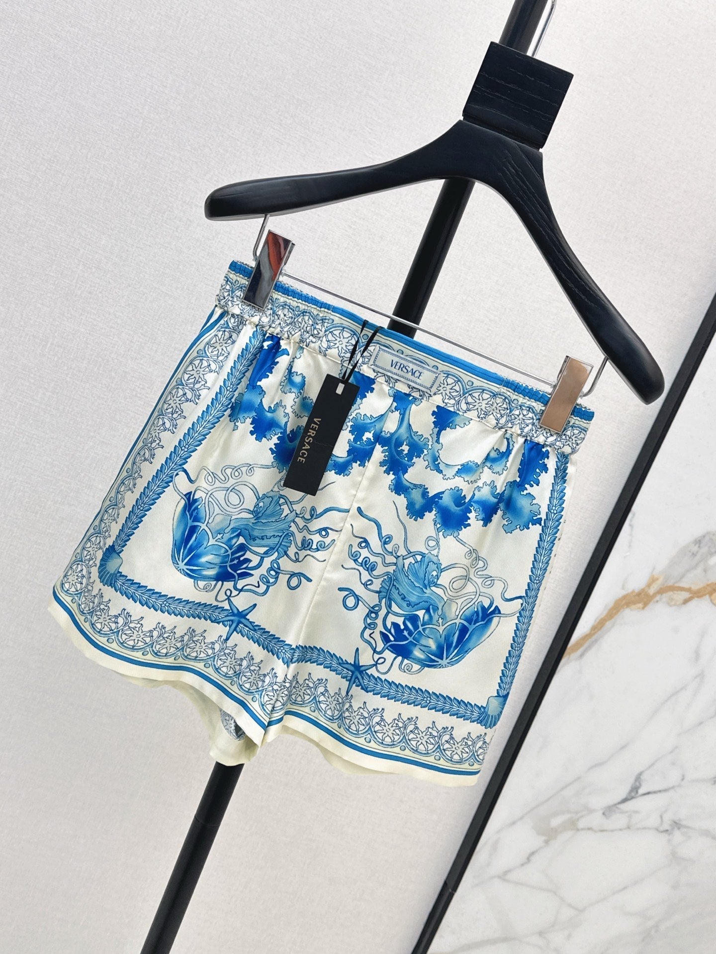 Versa* 25ss printed silk shorts