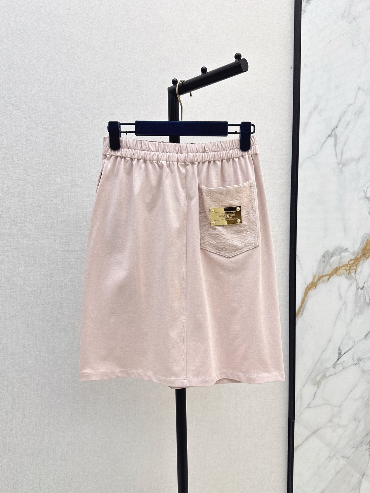 Loui* 25ss signature pocket back skirt