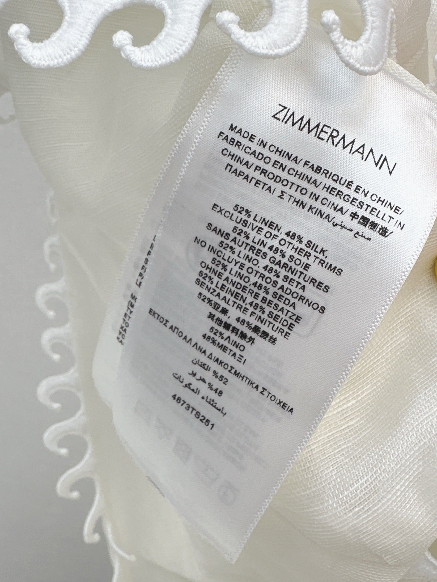 Zim* 25ss embroidered waterfall top