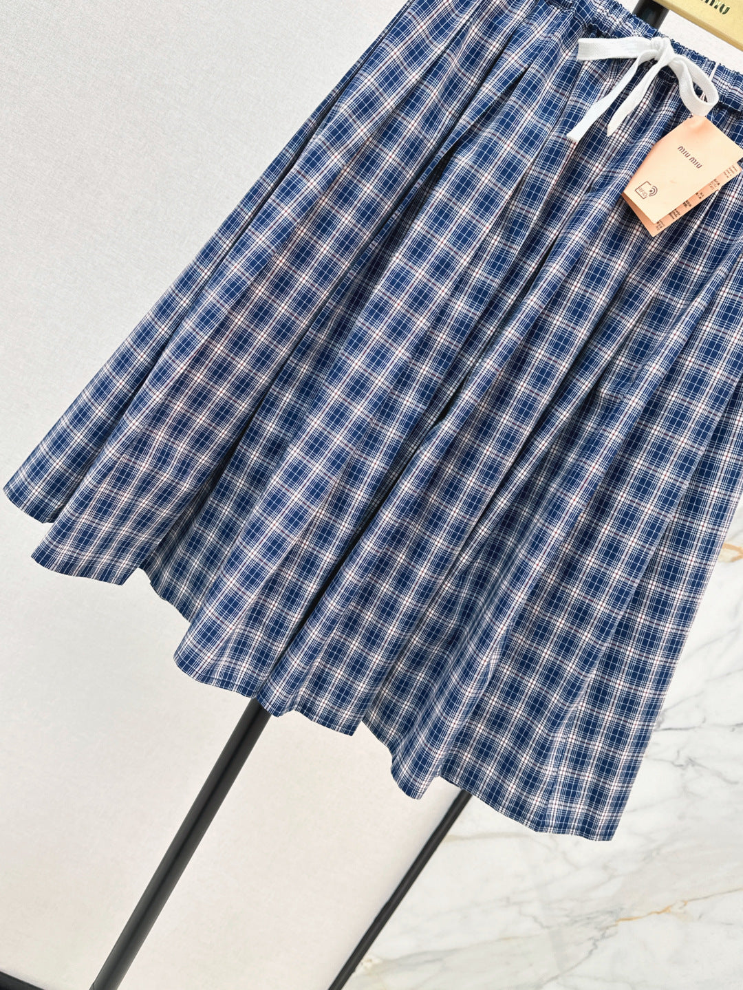 M*u 25ss check pleated skirt
