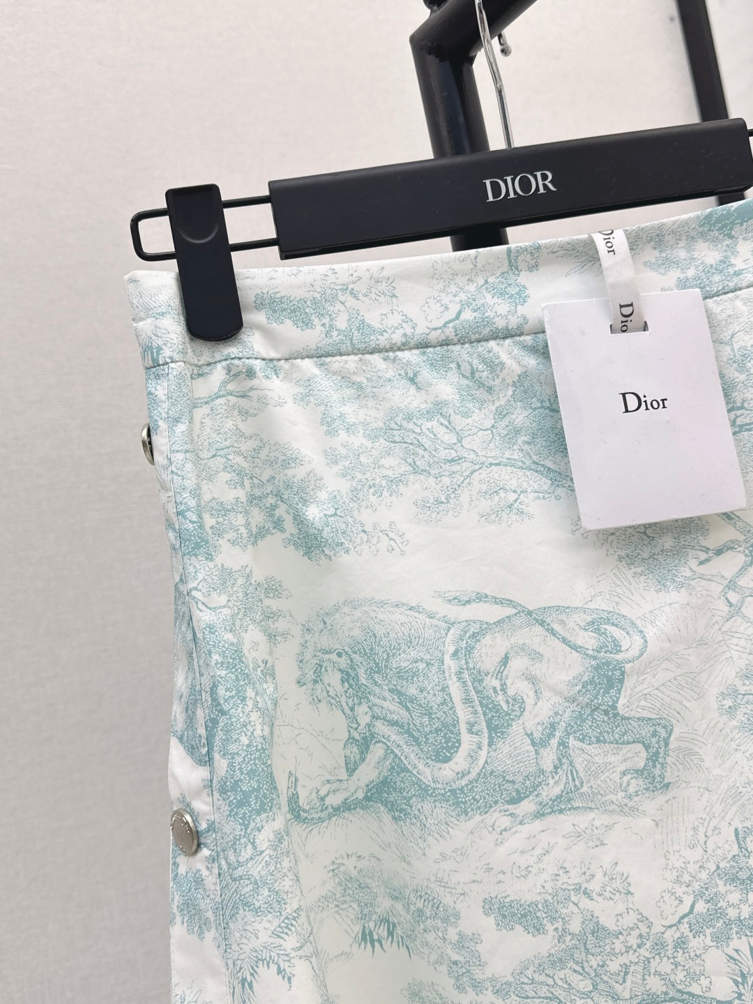 D*r 25ss mid-length flared skirt with buttons side