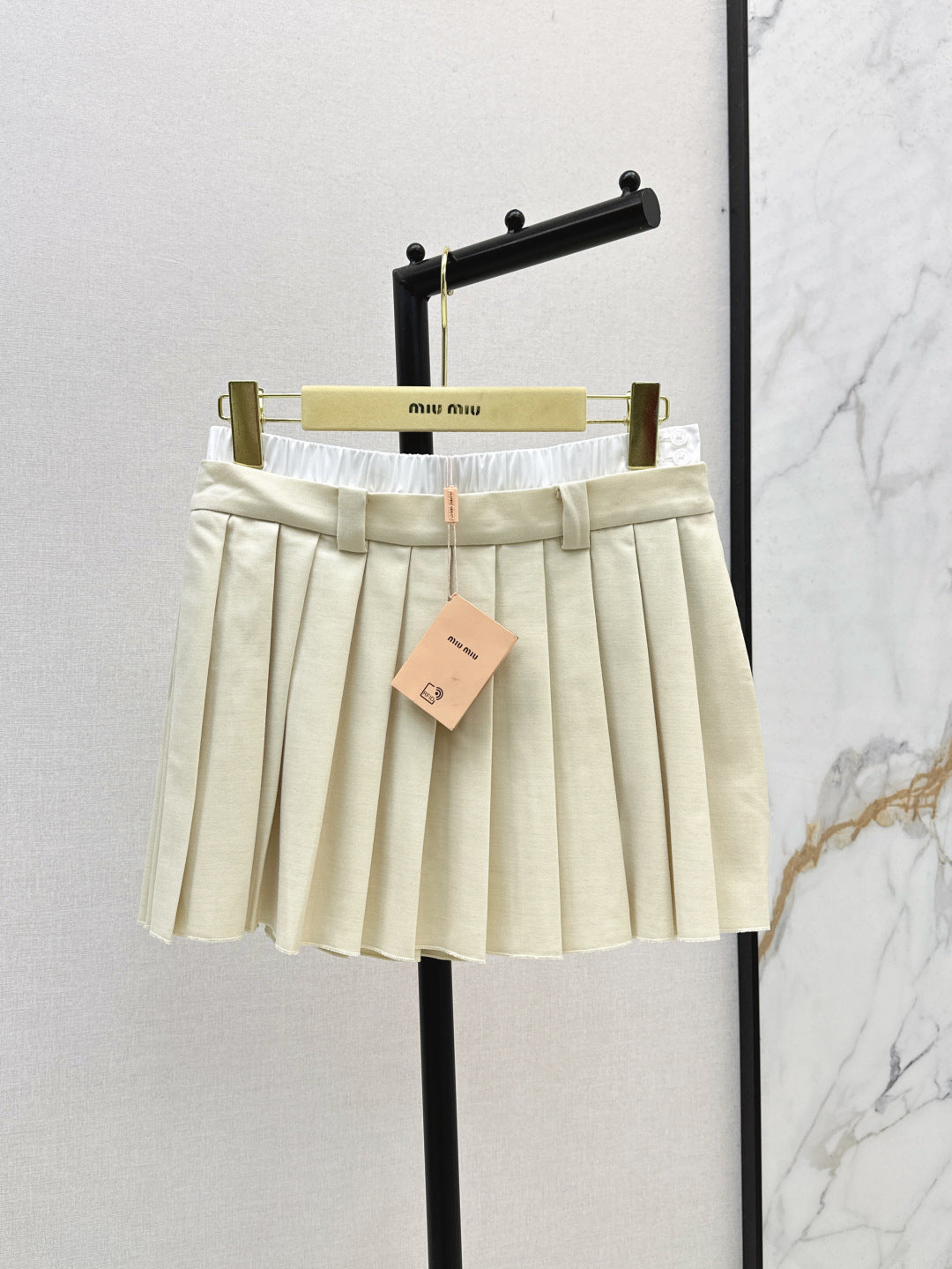 M*u 25ss color-blocked pleated miniskirt