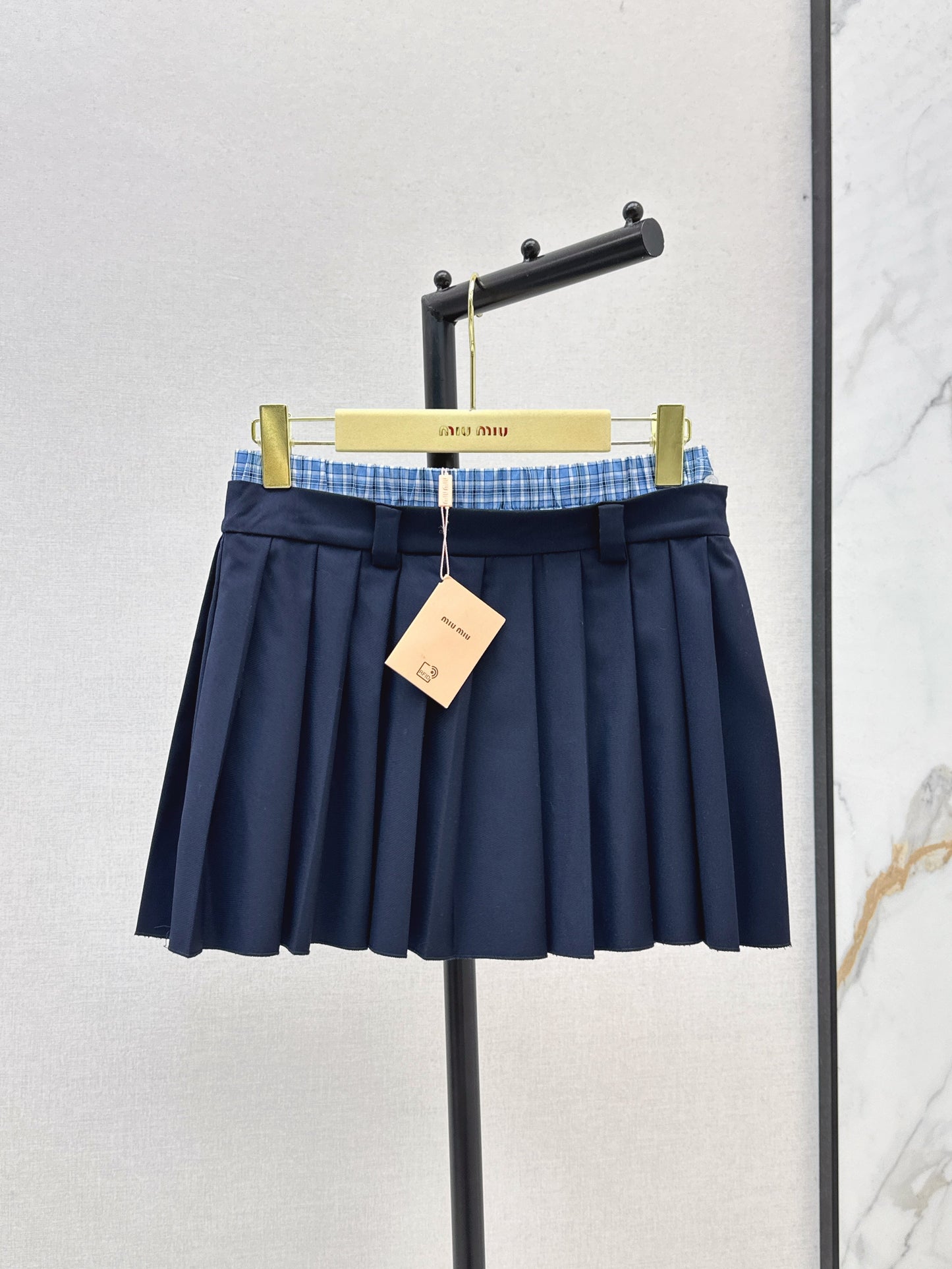 M*u 25ss color-blocked pleated miniskirt