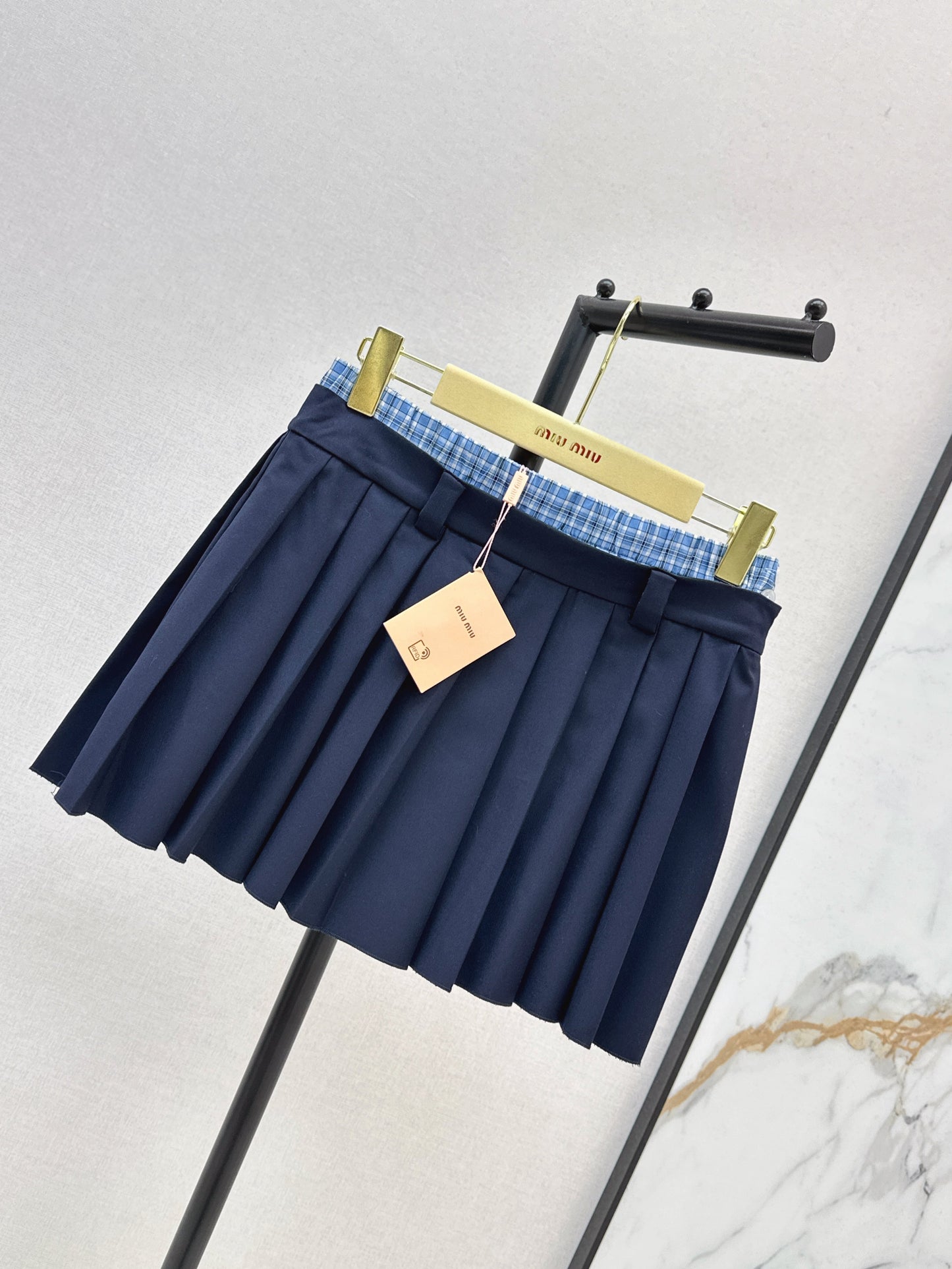 M*u 25ss color-blocked pleated miniskirt