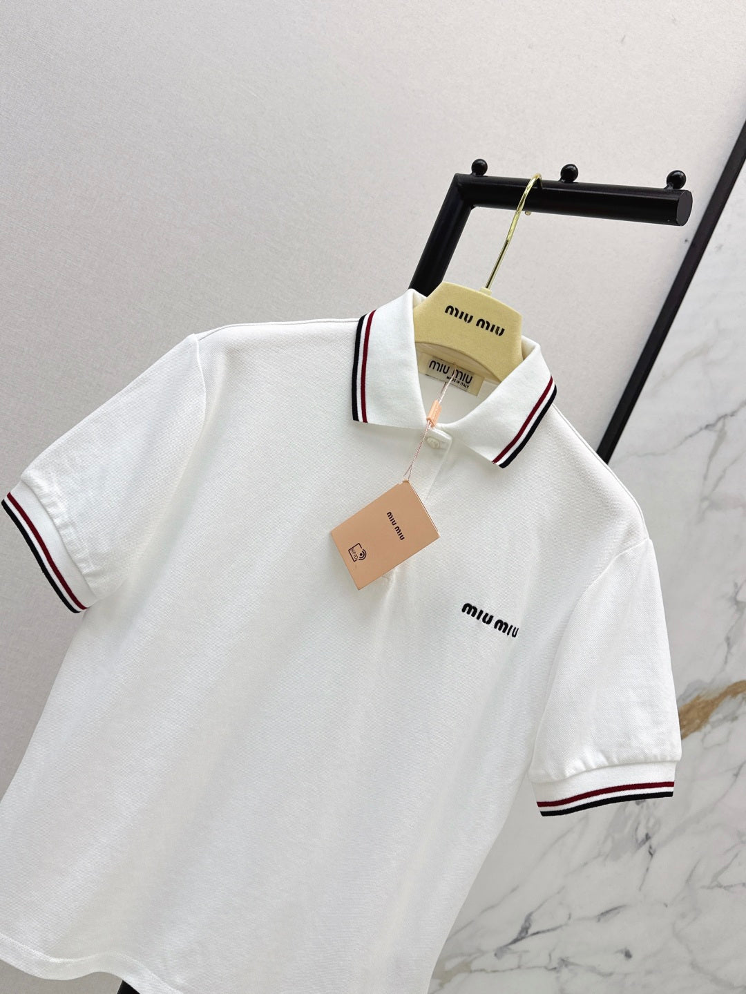 M*u 25ss embroidered polo shirt