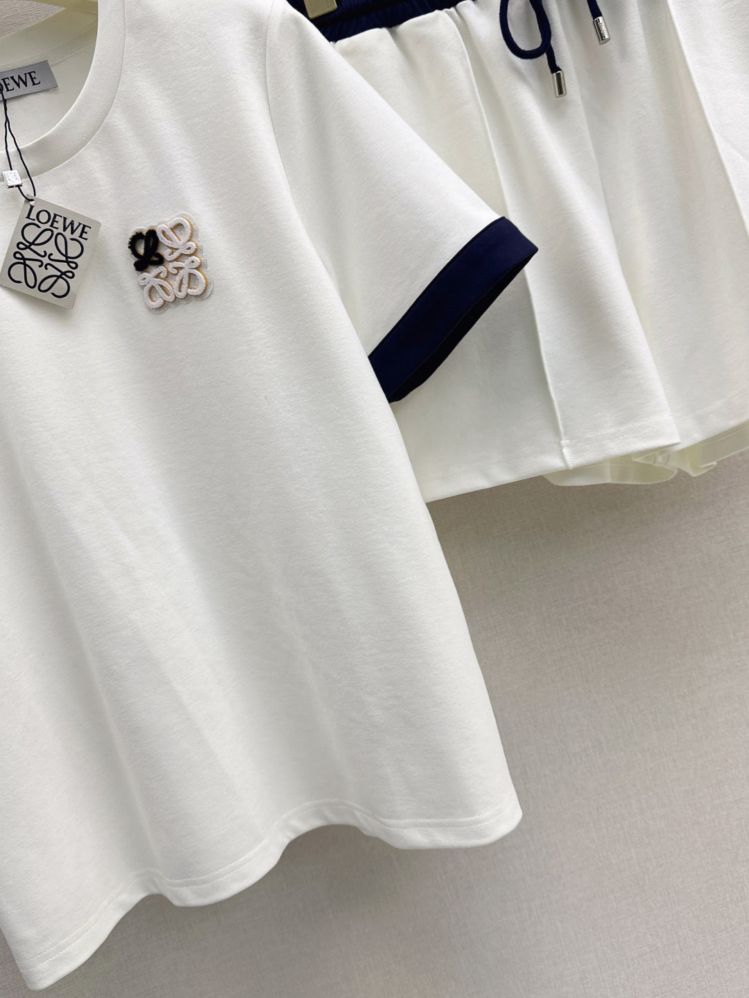 Low* 25ss color-block t-shirt and shorts set