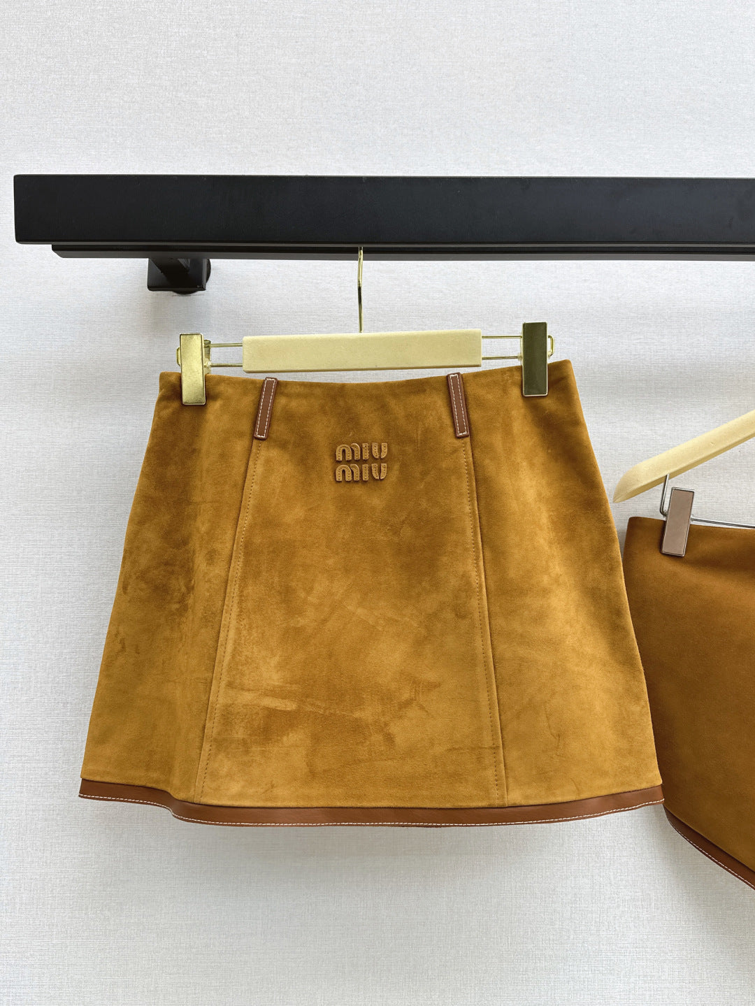 M*u 25ss suede skirt