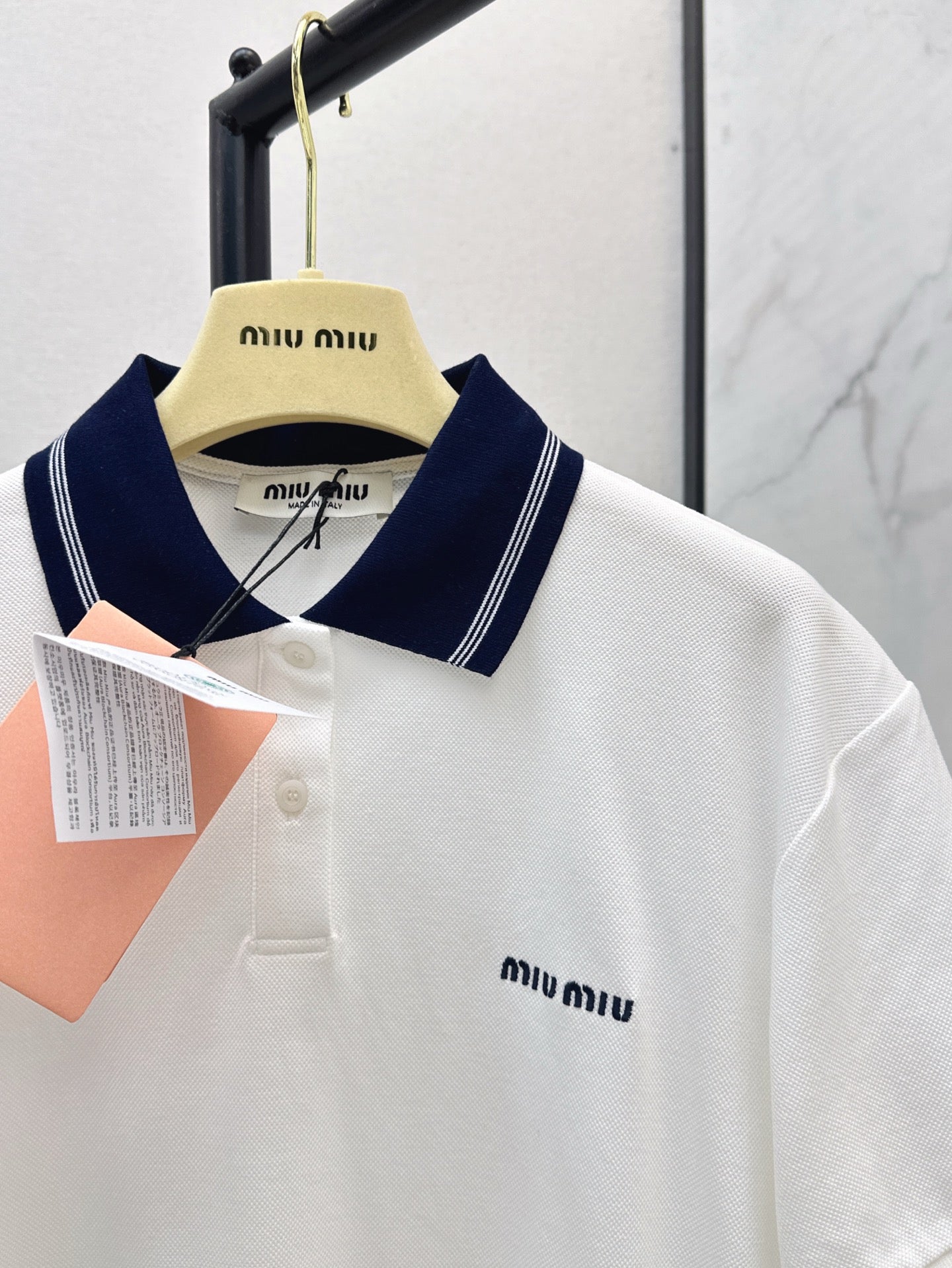 M*u 25ss embroidered polo shirt