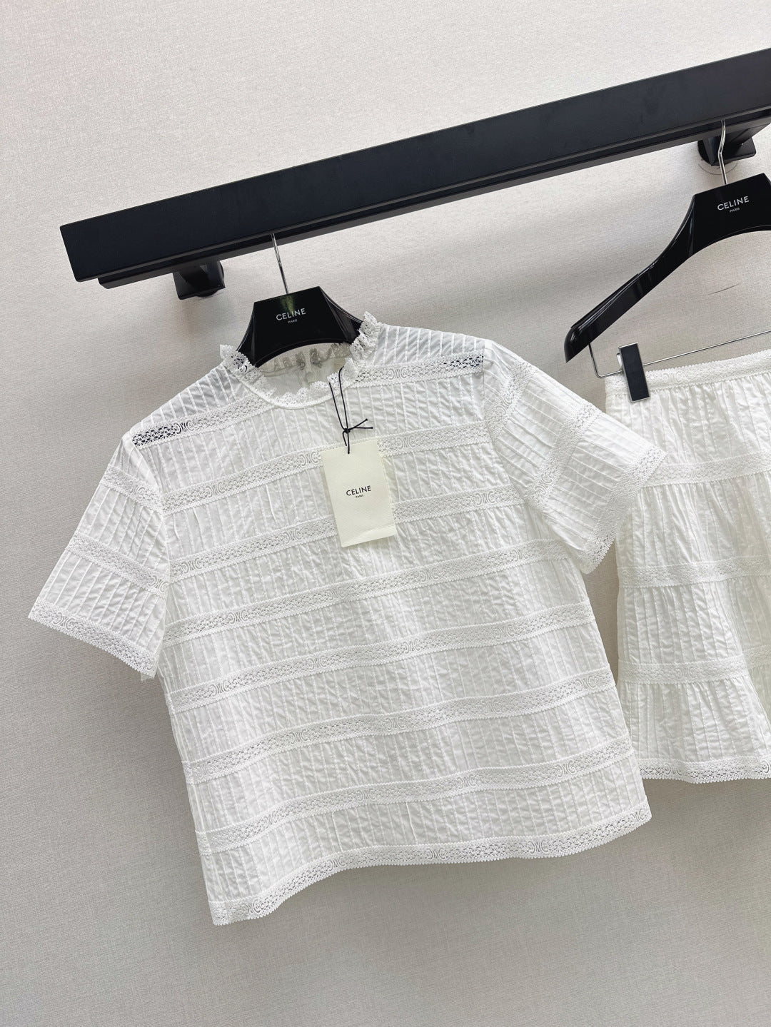 Cel* 25ss embroidered trim top and miniskirt set