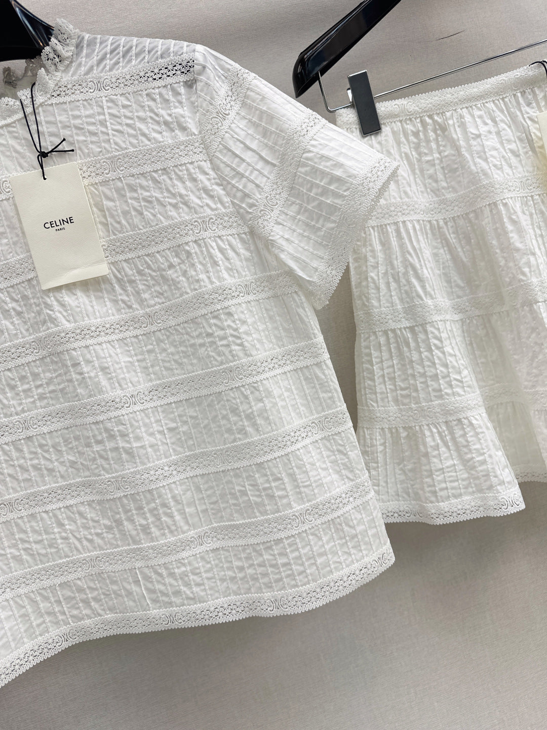 Cel* 25ss embroidered trim top and miniskirt set