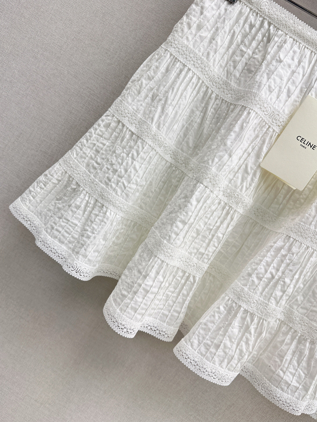 Cel* 25ss embroidered trim top and miniskirt set