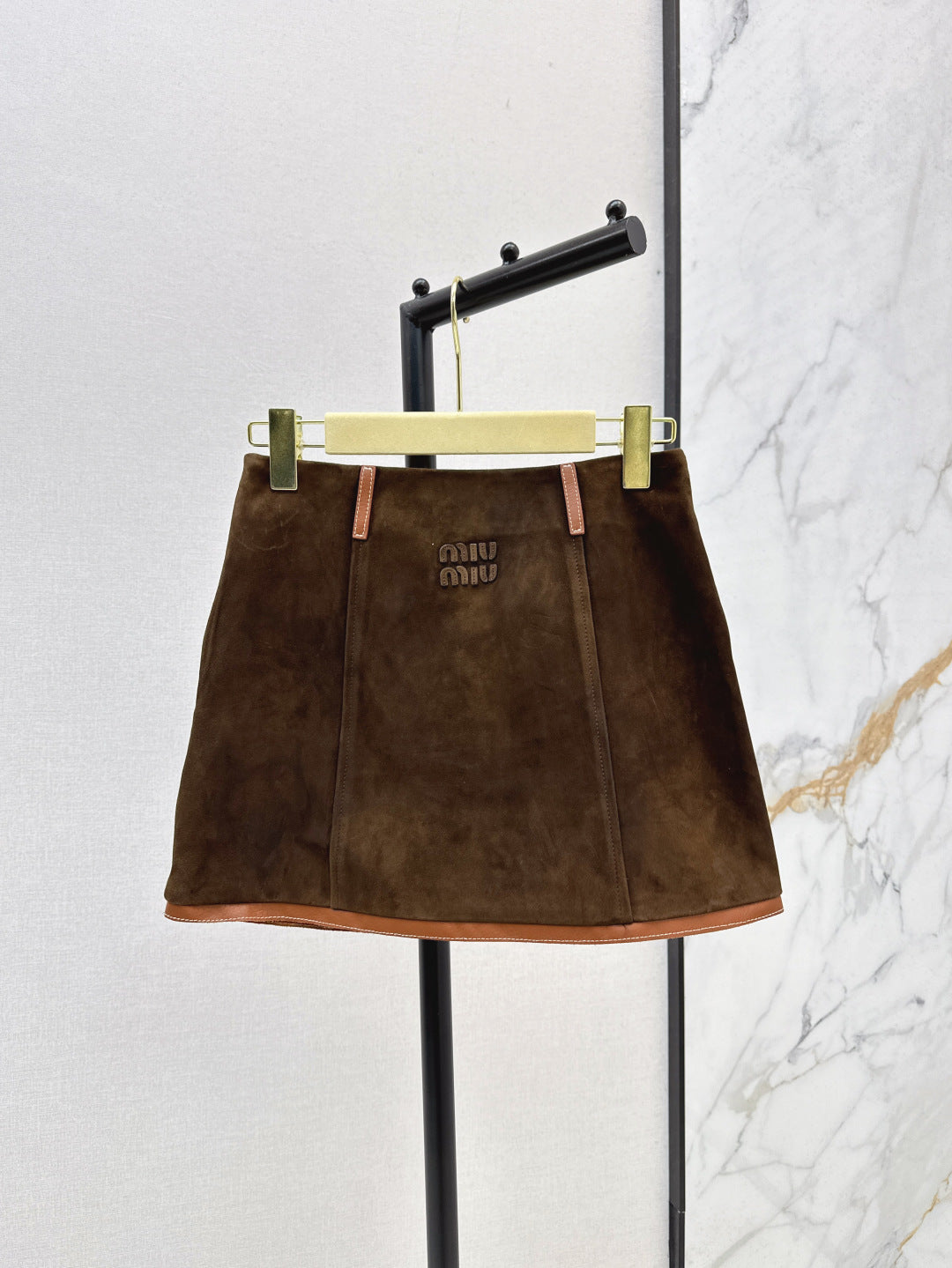 M*u 25ss suede shorts