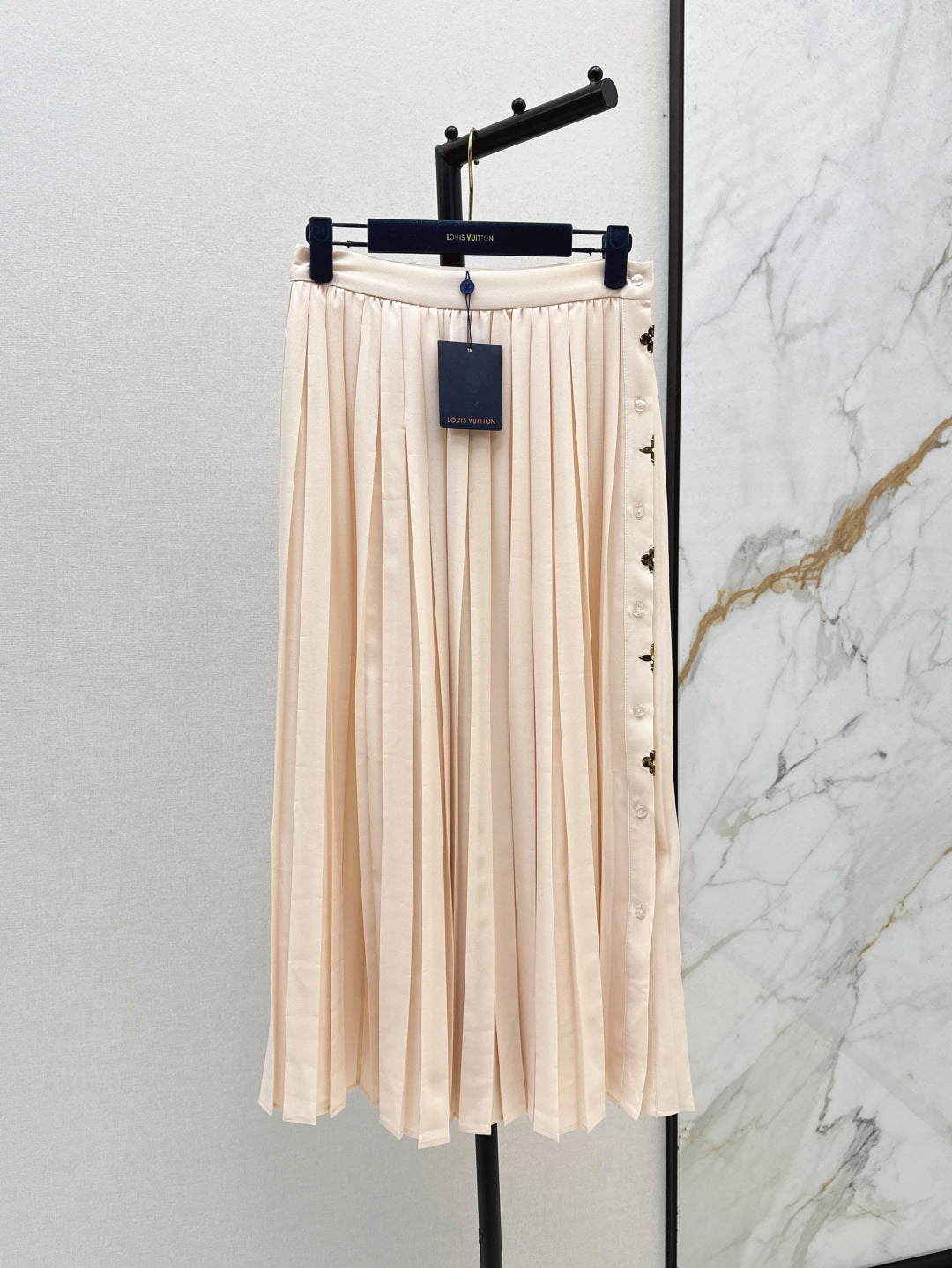Loui* golden monogram flower accent skirt