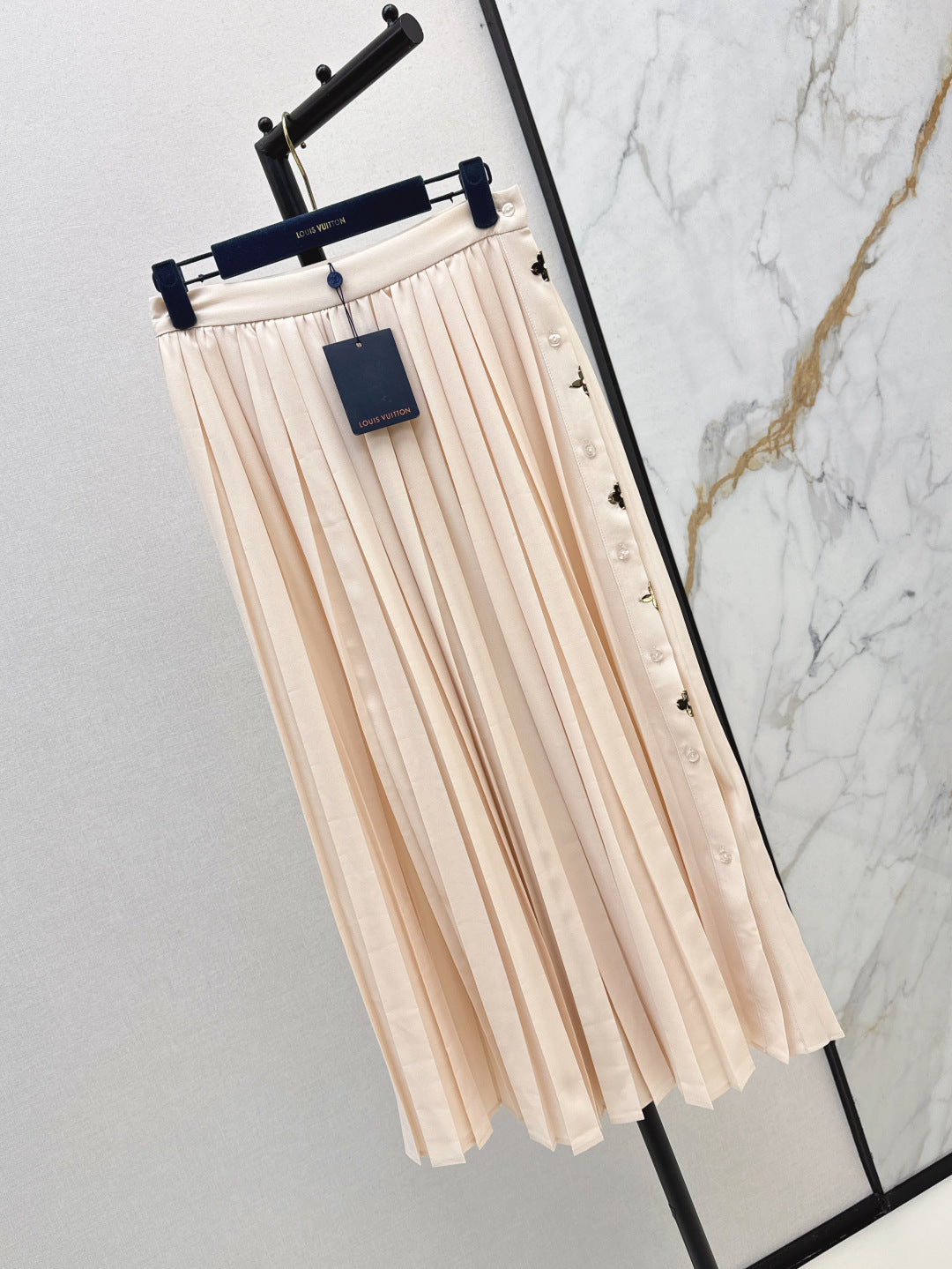 Loui* golden monogram flower accent skirt