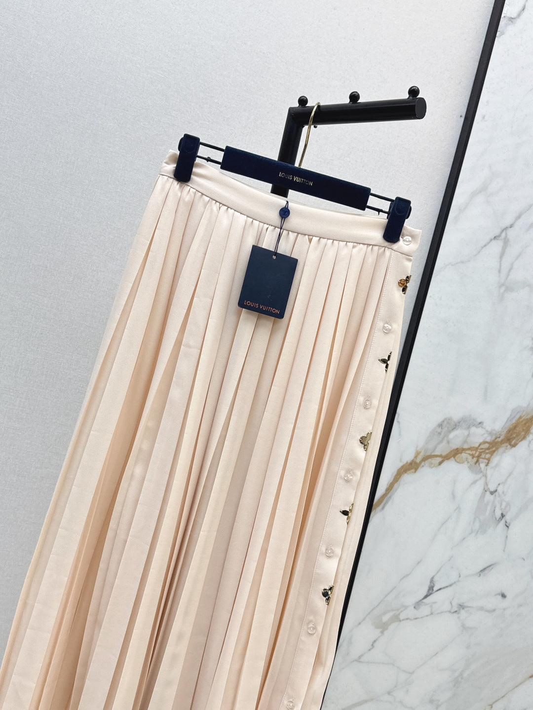 Loui* golden monogram flower accent skirt