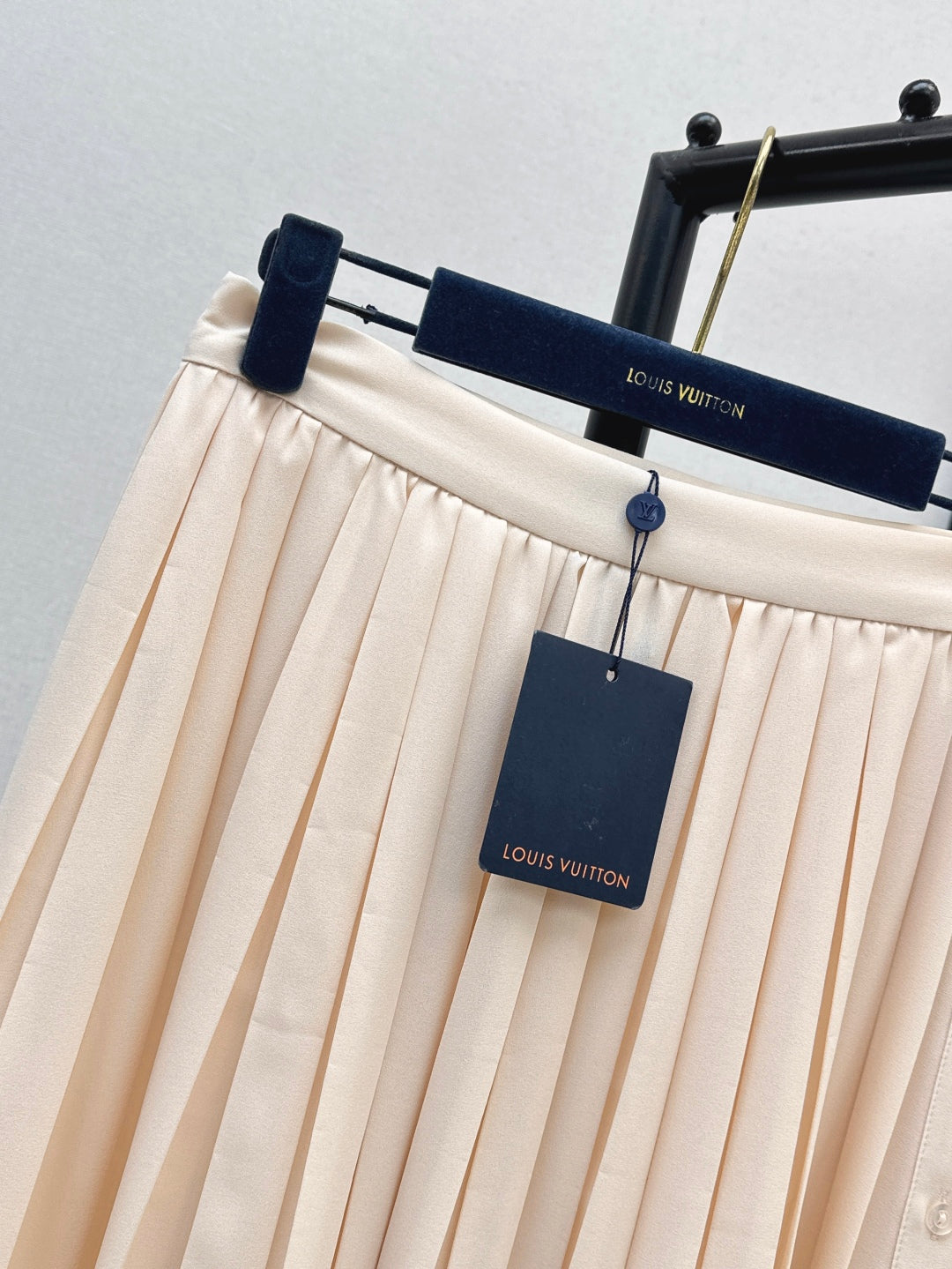 Loui* golden monogram flower accent skirt