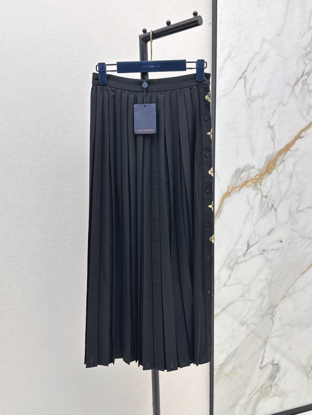 Loui* golden monogram flower accent skirt