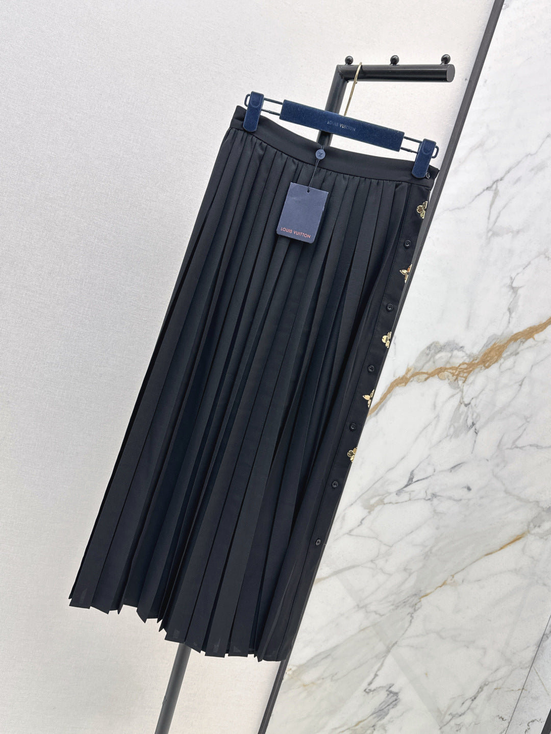 Loui* golden monogram flower accent skirt