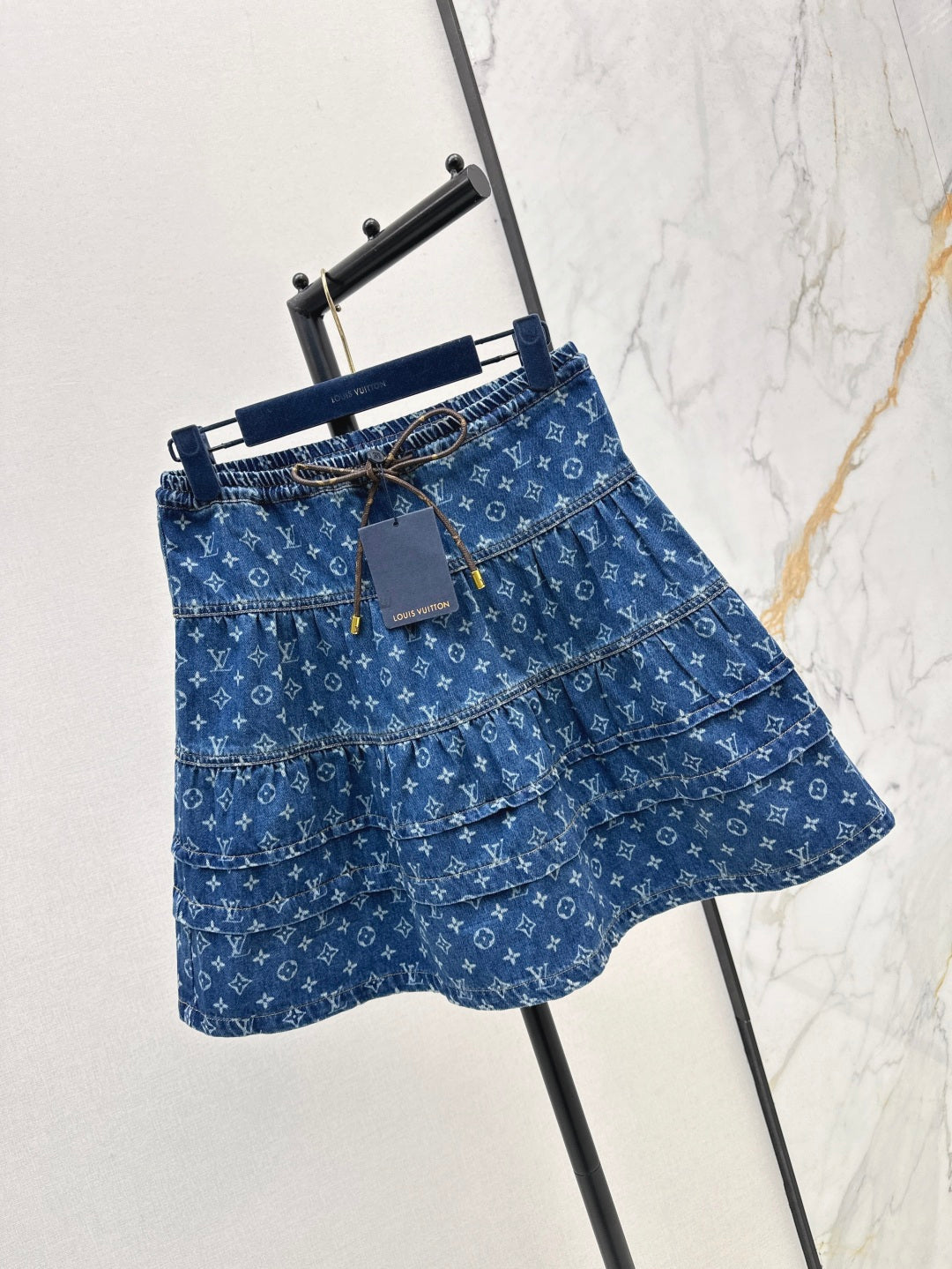 Loui* 25ss monogram tiered denim skirt