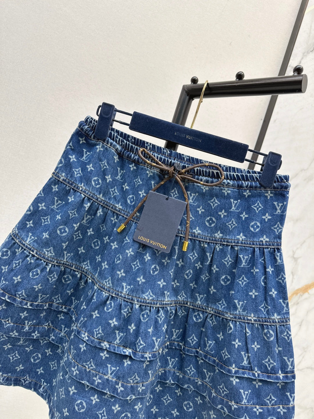 Loui* 25ss monogram tiered denim skirt