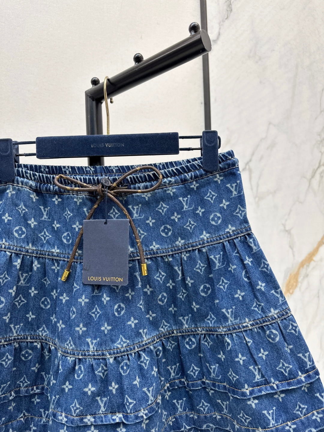 Loui* 25ss monogram tiered denim skirt