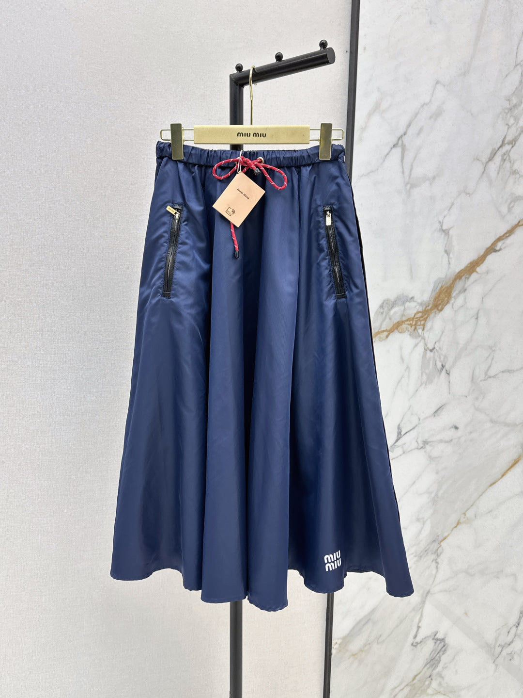 M*u 25ss tech canvas flared skirt