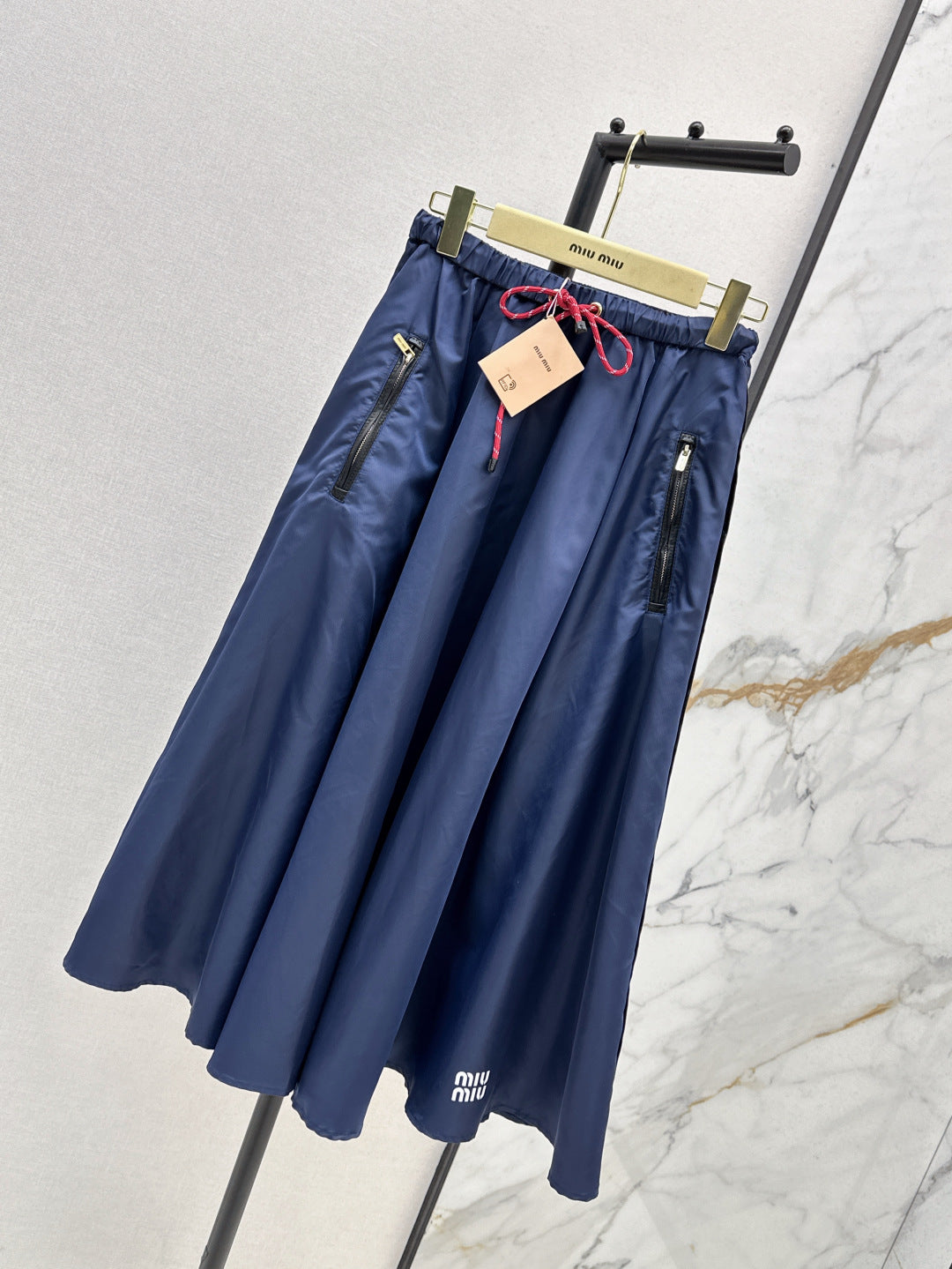 M*u 25ss tech canvas flared skirt