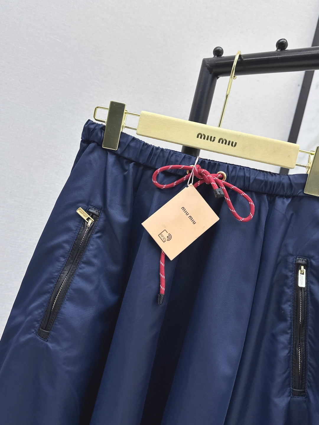 M*u 25ss tech canvas flared skirt