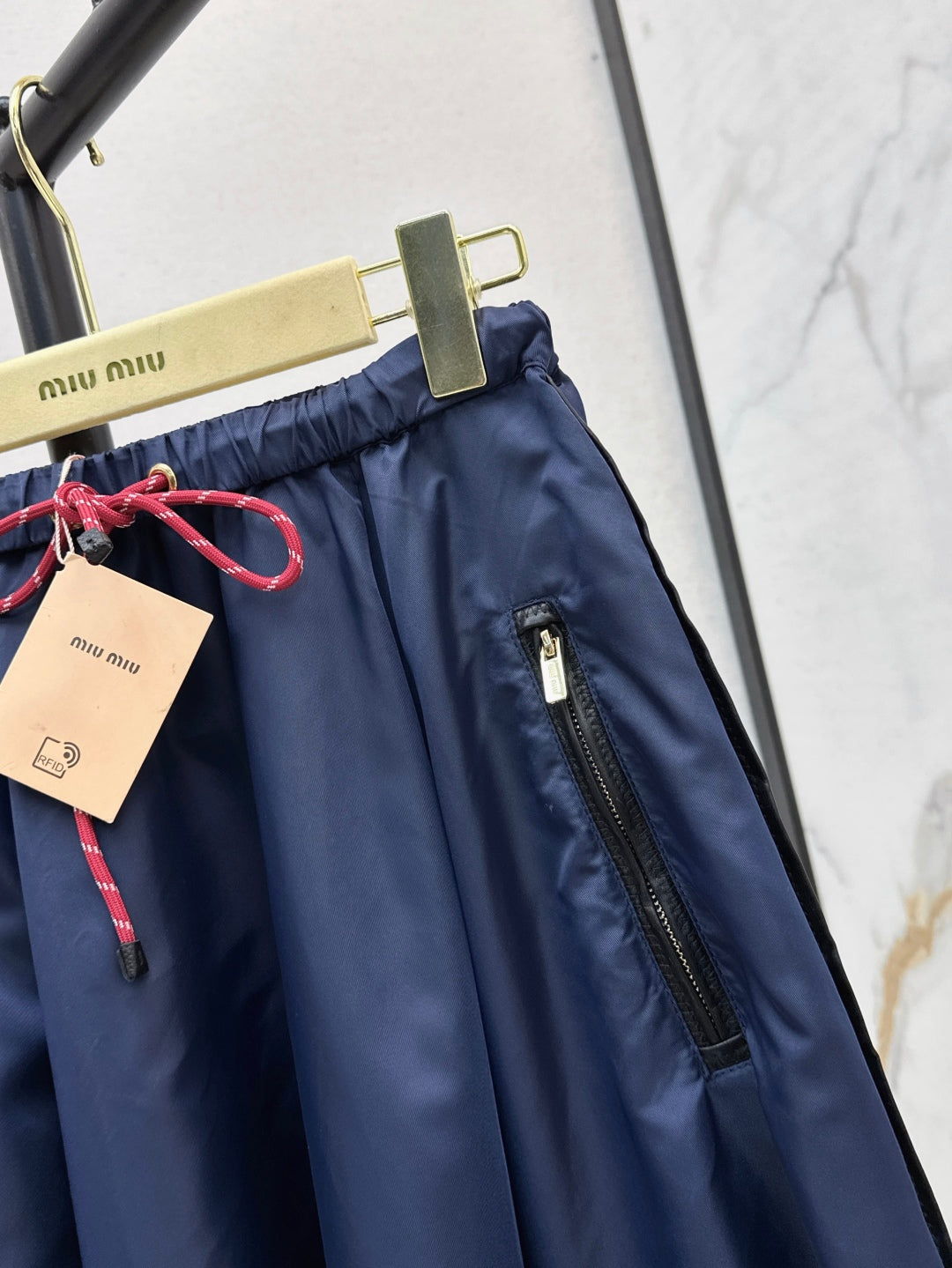 M*u 25ss tech canvas flared skirt