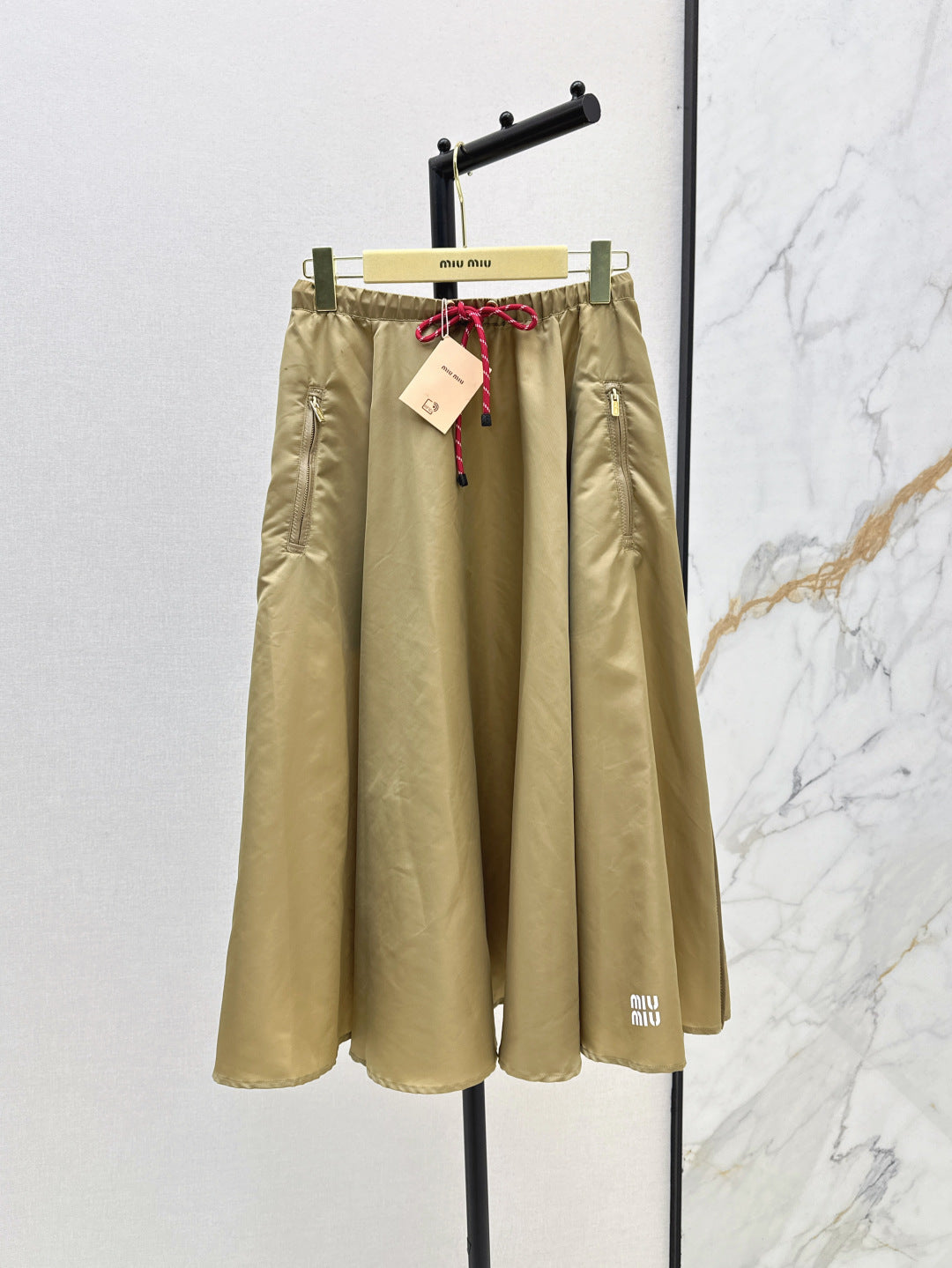 M*u 25ss tech canvas flared skirt
