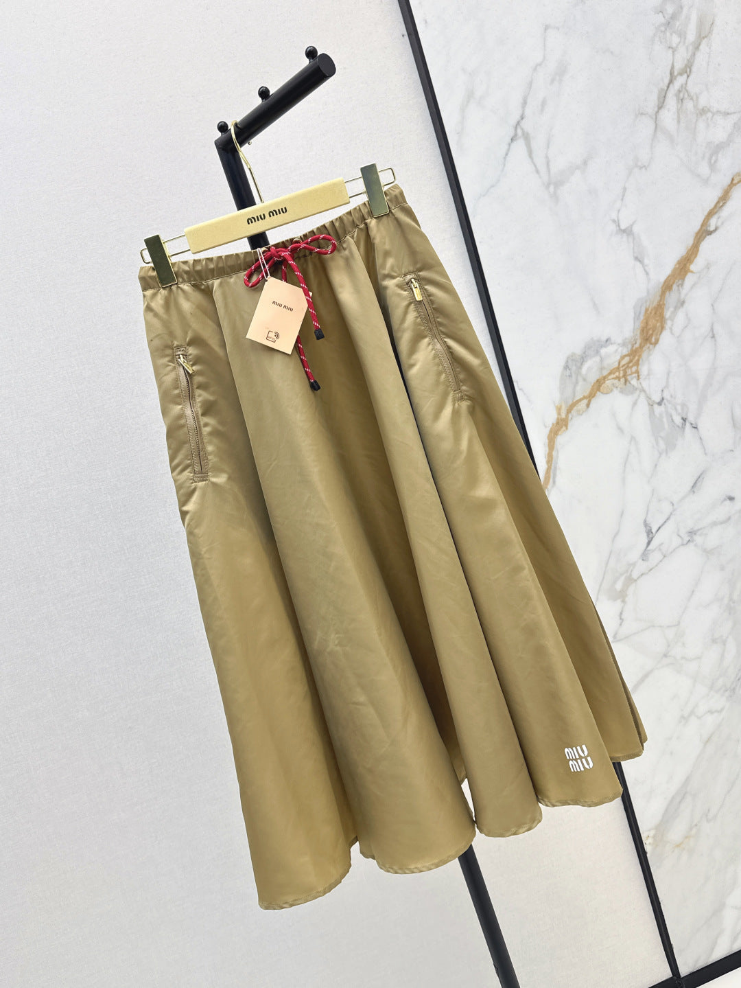 M*u 25ss tech canvas flared skirt