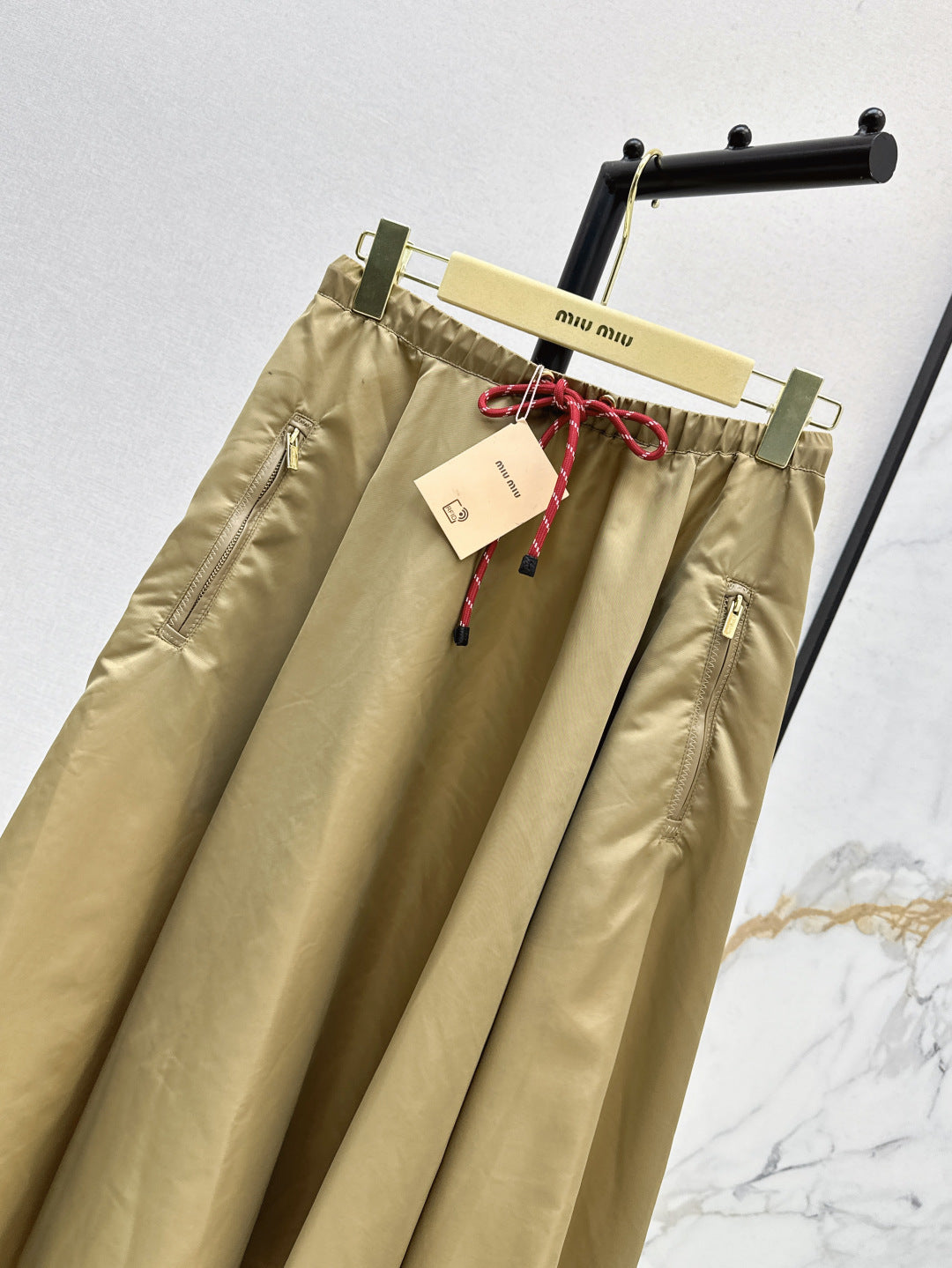 M*u 25ss tech canvas flared skirt