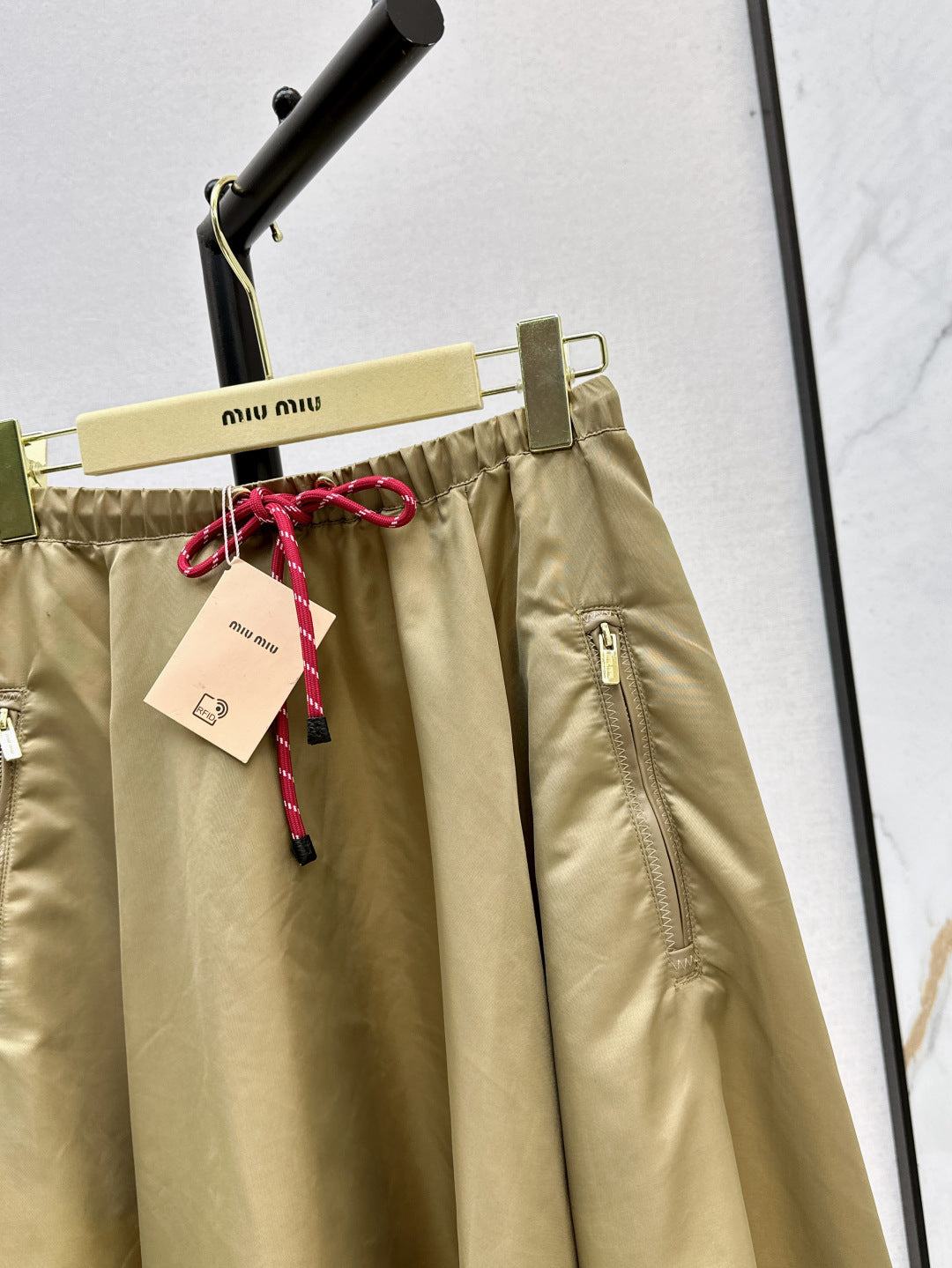 M*u 25ss tech canvas flared skirt