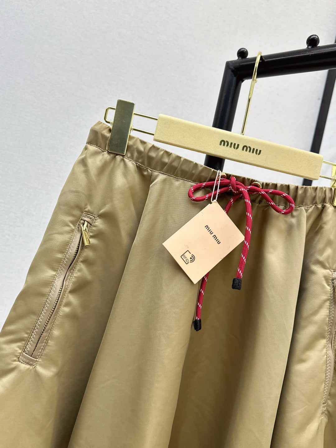 M*u 25ss tech canvas flared skirt